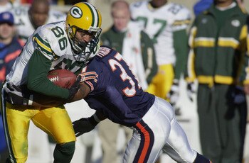 11 Nov 2001: Receiver Antonio Freeman #86 of the Green Bay Packers hauls in a pass and breaks a tackle by safety Tony Parrish #37 of the Chicago Bears at Soldier Field in Chicago, Illinois. The Packers won 20-12. DIGITAL IMAGE. Mandatory Credit: Jonathan 