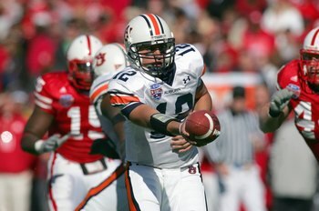 DALLAS - JANUARY 01: Quarterback Brandon Cox #12 of the Auburn Tigers hands off the ball during the AT&T Cotton Bowl Classic against the Nebraska Cornhuskers on January 1, 2007 at the Cotton Bowl in Dallas, TX. (Photo by Ronald Martinez/Getty Images)