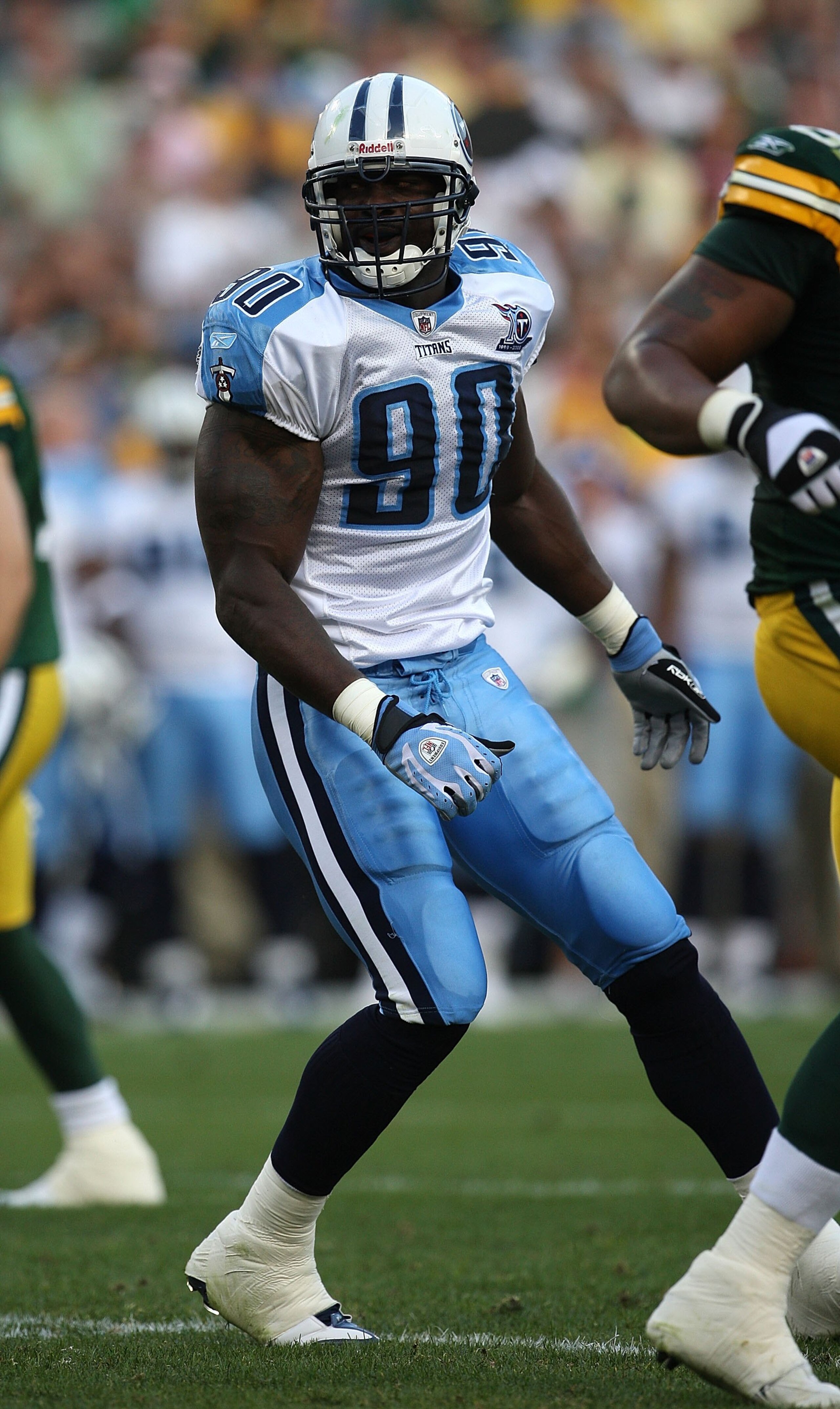 GREEN BAY, WI - AUGUST 28: Jevon Kearse #90 of the Tenessee Titans prepares to rush against the Green Bay Packers on August 28, 2008 at Lambeau Field in Green Bay, Wisconsin. The Titans defeated the Packers 23-21. (Photo by Jonathan Daniel/Getty Images)