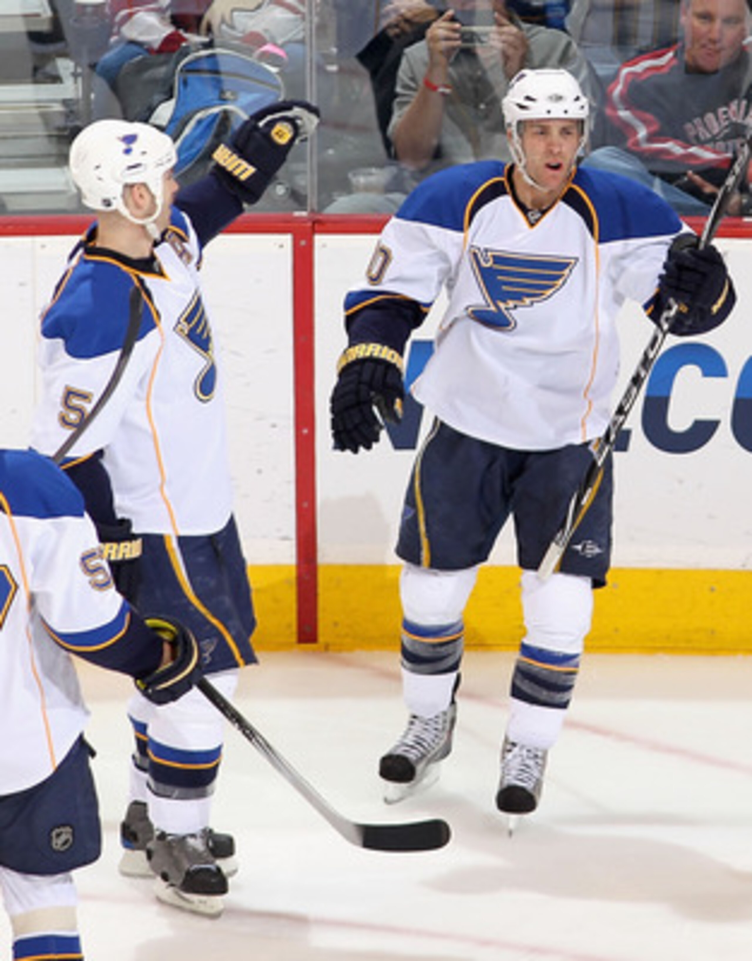 GLENDALE, AZ - MARCH 02:  Andy McDonald #10 of the St. Louis Blues celebrates with teammates David Perron #57, Barret Jackman #5 and Patrik Berglund #21 after McDonald scored a second period goal against the Phoenix Coyotes during the NHL game at Jobing.c