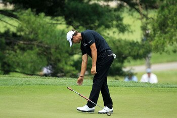 BETHESDA, MD - JUNE 16:  Adam Scott of Australia reacts to missing a birdie putt on the eigth green during the first round of the 111th U.S. Open at Congressional Country Club on June 16, 2011 in Bethesda, Maryland.  (Photo by David Cannon/Getty Images)