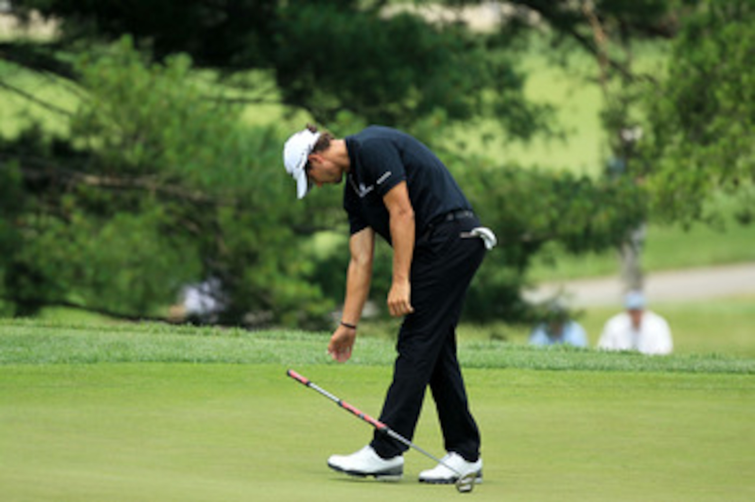 BETHESDA, MD - JUNE 16: Adam Scott of Australia reacts to missing a birdie putt on the eigth green during the first round of the 111th U.S. Open at Congressional Country Club on June 16, 2011 in Bethesda, Maryland. (Photo by David Cannon/Getty Images) BETHESDA, MD - JUNE 16: Adam Scott of Australia reacts to missing a birdie putt on the eigth green during the first round of the 111th U.S. Open at Congressional Country Club on June 16, 2011 in Bethesda, Maryland. (Photo by David Cannon/Getty Images)