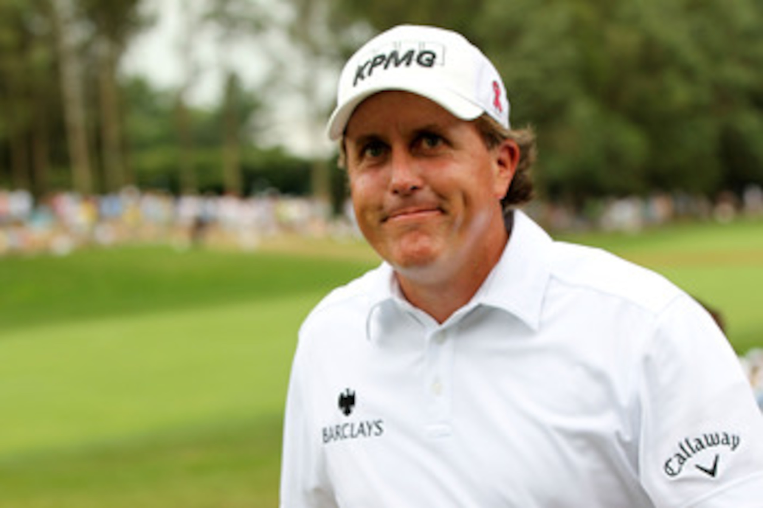 BETHESDA, MD - JUNE 18: Phil Mickelson walks off the 18th green during the third round of the 111th U.S. Open at Congressional Country Club on June 18, 2011 in Bethesda, Maryland. (Photo by Jamie Squire/Getty Images) BETHESDA, MD - JUNE 18: Phil Mickelson walks off the 18th green during the third round of the 111th U.S. Open at Congressional Country Club on June 18, 2011 in Bethesda, Maryland. (Photo by Jamie Squire/Getty Images)