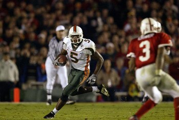 3 Jan 2002:  Andre Johnson #5 of Miami runs against the defense of Keyuo Craver #3 of Nebraska during the Rose Bowl National Championship game at the Rose Bowl in Pasadena, California.  Miami won the game 37-14, winning the BCS and the National Championsh