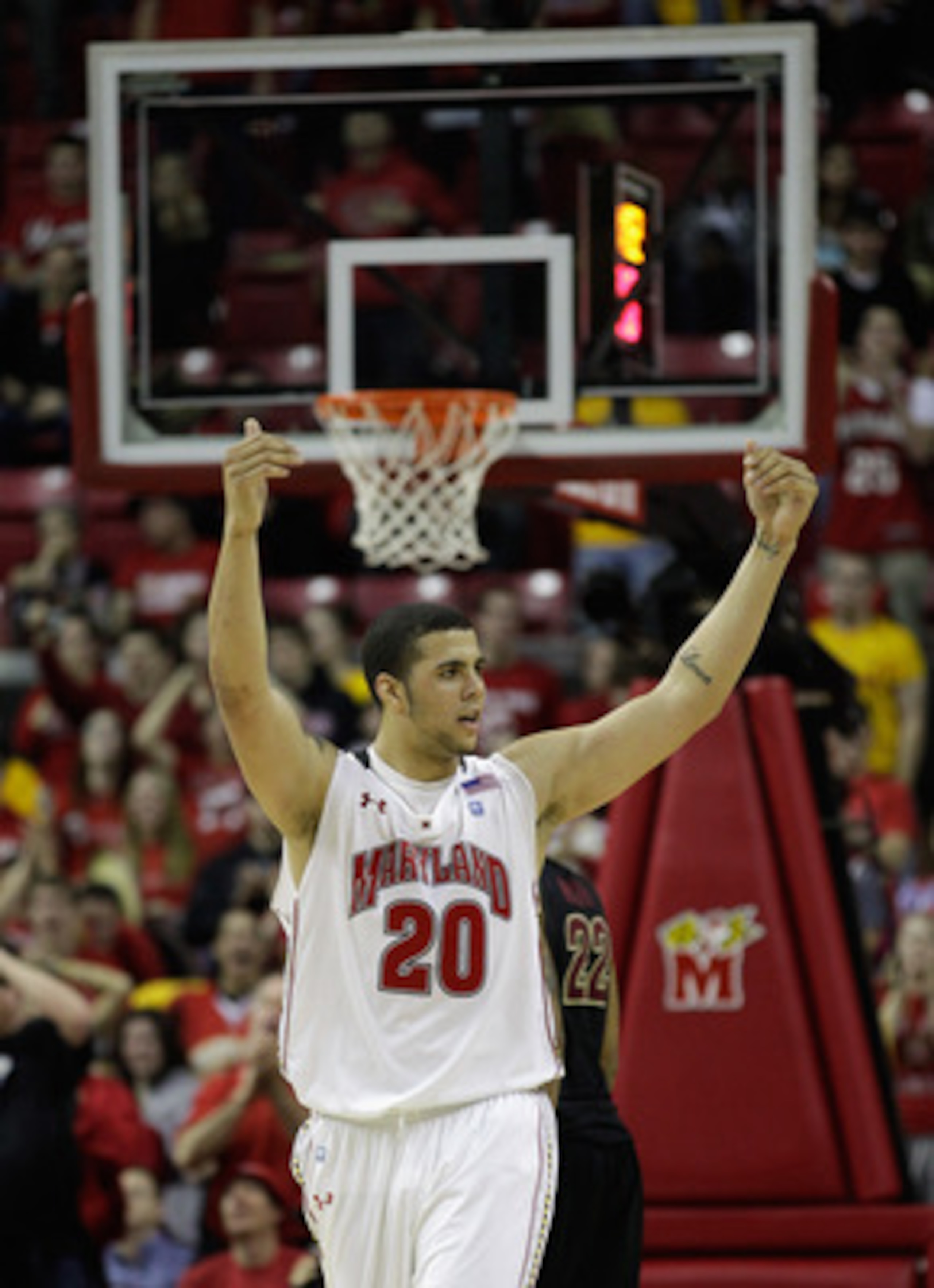 COLLEGE PARK, MD - FEBRUARY 23: Jordan Williams #20 of the Maryland Terrapins celebrates against the Florida State Seminoles at the Comast Center on February 23, 2011 in College Park, Maryland.  (Photo by Rob Carr/Getty Images)