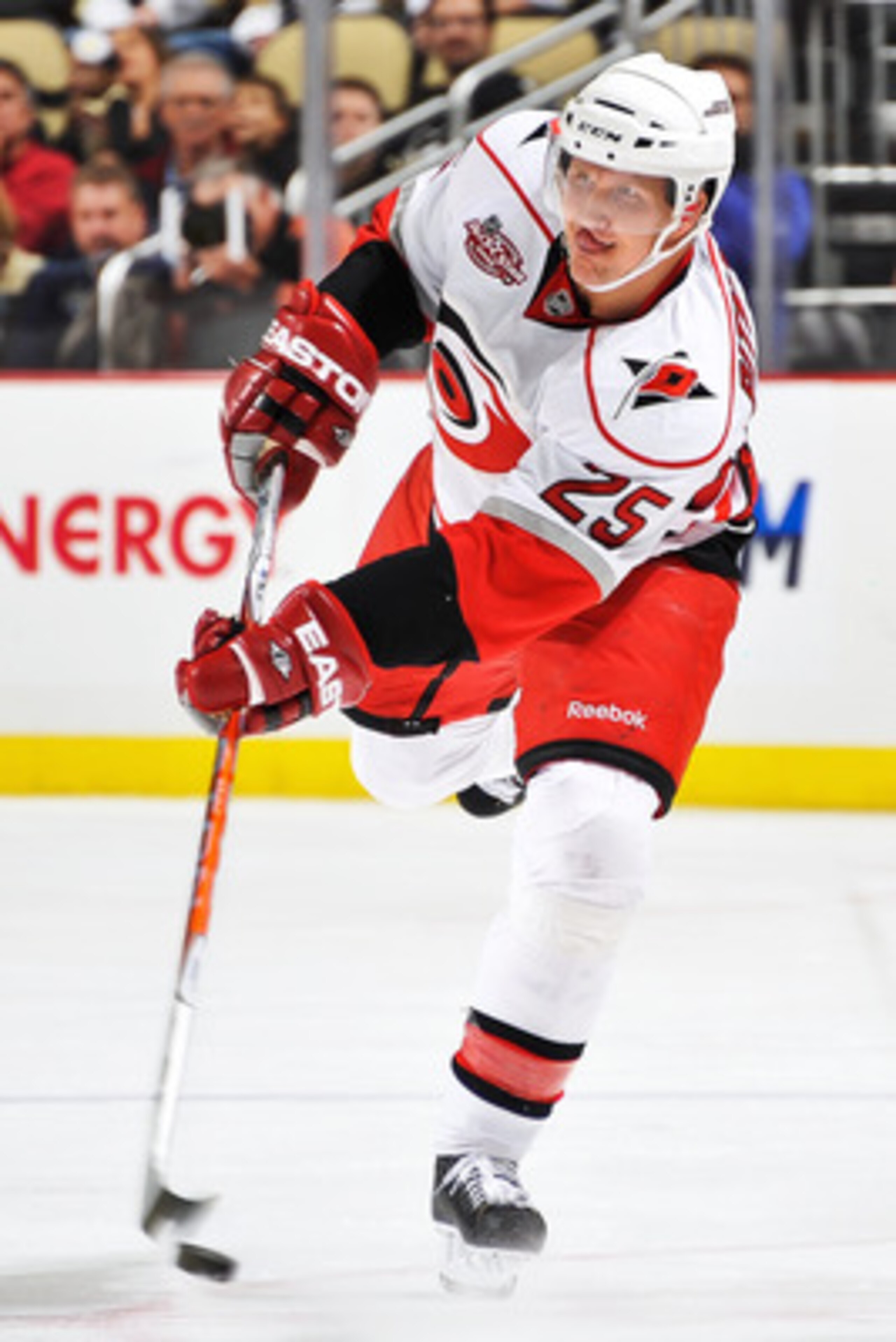 PITTSBURGH - NOVEMBER 19:  Joni Pitkanen #25 of the Carolina Hurricanes skates with the puck against the Pittsburgh Penguins on November 19, 2010 at Consol Energy Center in Pittsburgh, Pennsylvania.  (Photo by Jamie Sabau/Getty Images)