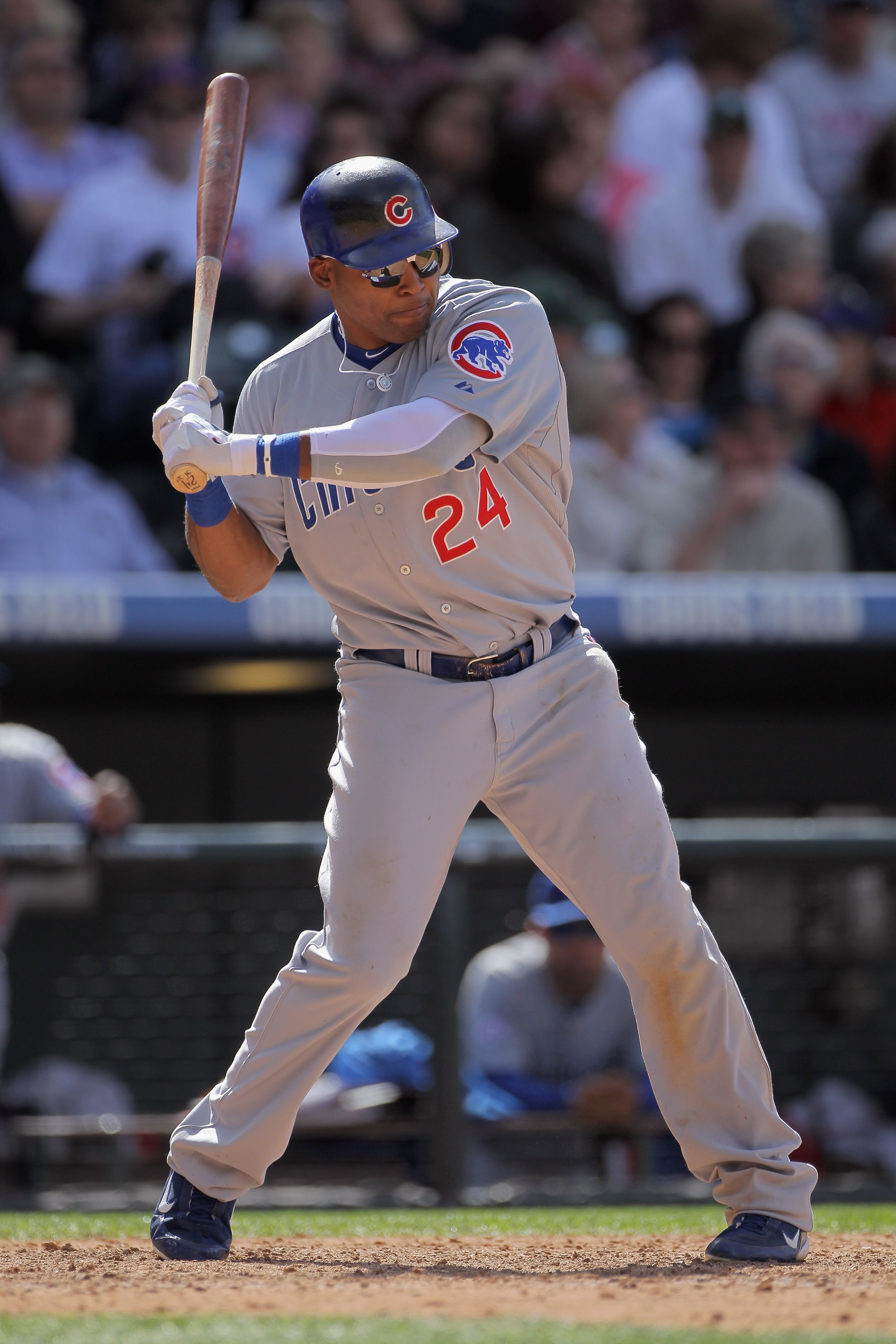 DENVER, CO - APRIL 17:  Marlon Byrd #24 of the Chicago Cubs takes an at bat against the Colorado Rockies at Coors Field on April 17, 2011 in Denver, Colorado.  (Photo by Doug Pensinger/Getty Images)