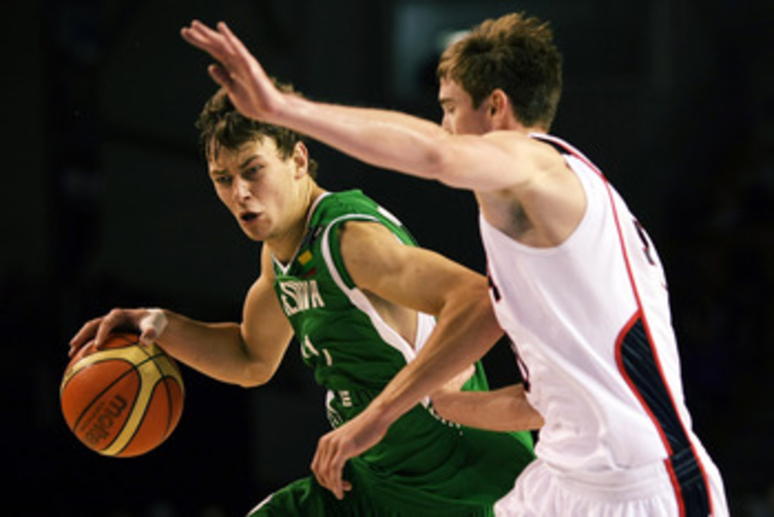 AUCKLAND, NEW ZEALAND - JULY 08: Donatas Motiejunas of Lithuania tries to get past Gordon Hayward of the United States defends during the U19 Basketball World Championships match between the United States and Lithuania at North Shore Events Centre on Jul AUCKLAND, NEW ZEALAND - JULY 08: Donatas Motiejunas of Lithuania tries to get past Gordon Hayward of the United States defends during the U19 Basketball World Championships match between the United States and Lithuania at North Shore Events Centre on Jul
