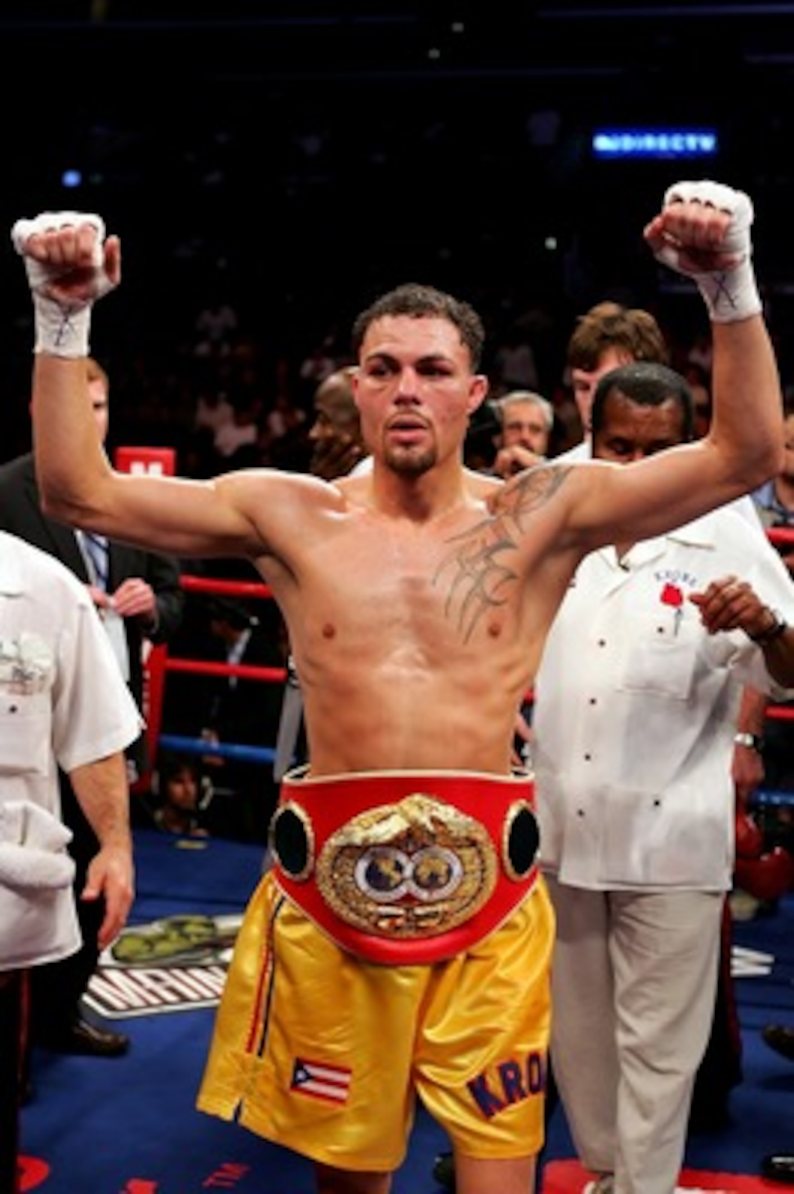 LOS ANGELES, CA - NOVEMBER 23:  Kermit Cintron celebrates his victory over Jesse Feliciano in the IBF Welterweight title fight at Staples Center on November 23, 2007 in Los Angeles, California.  Cintron won the fight by way of TKO in the 10th round.  (Pho