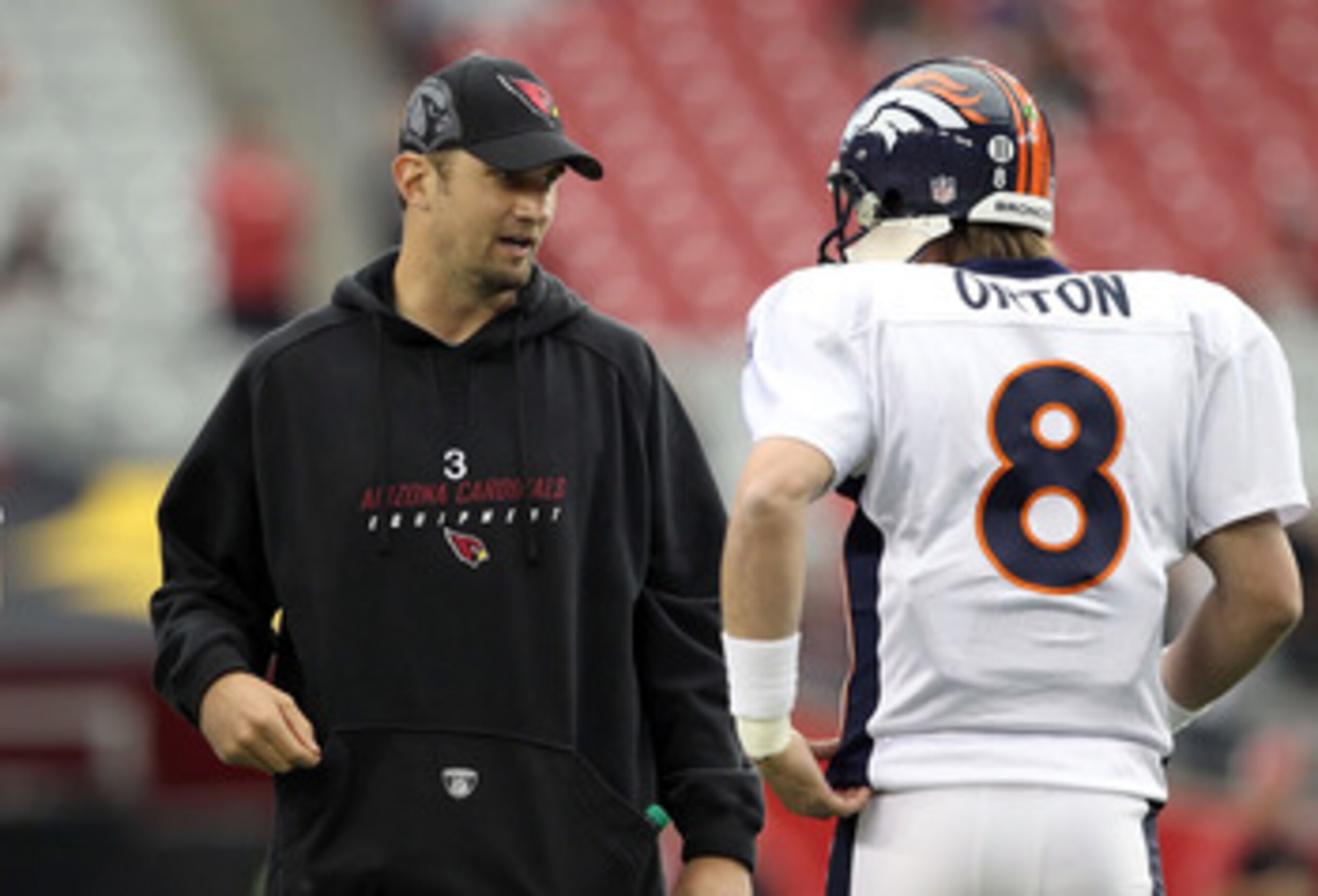GLENDALE, AZ - DECEMBER 12:  Quarterbacks Derek Anderson #3 of the Arizona Cardinals talks with Kyle Orton #8 of the Denver Broncos before the NFL game at the University of Phoenix Stadium on December 12, 2010 in Glendale, Arizona. The Cardinals defeated