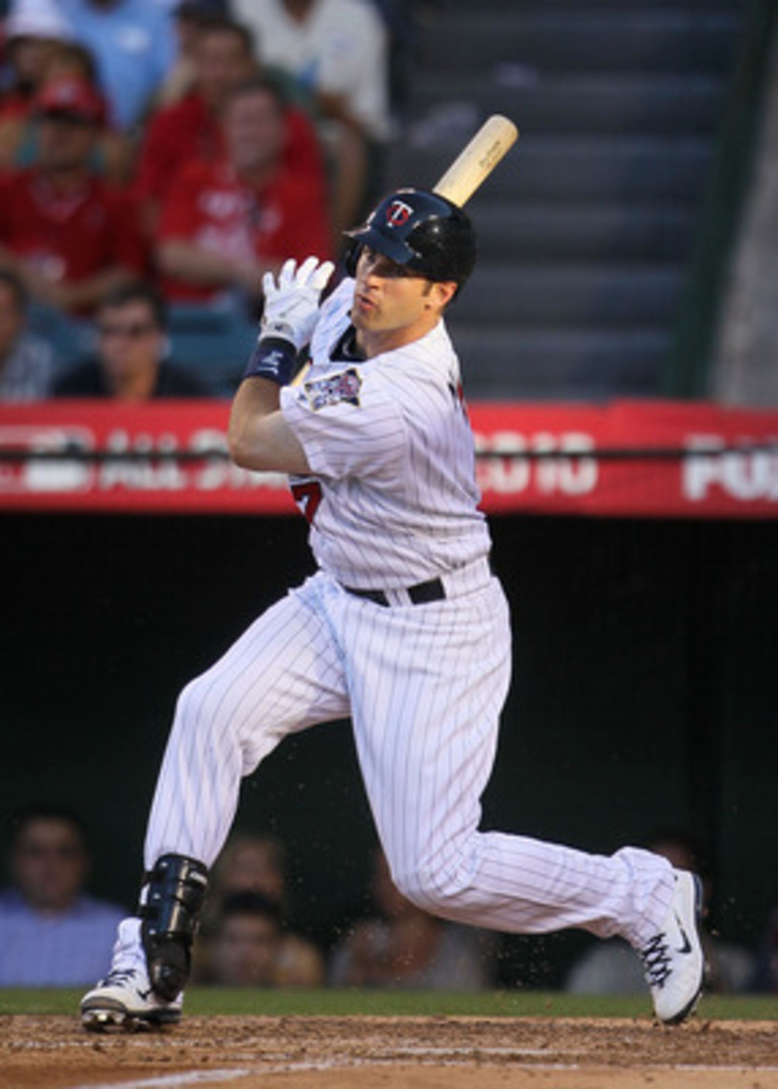 ANAHEIM, CA - JULY 13: American League All-Star Joe Mauer #7 of the Minnesota Twins swings the bat during the 81st MLB All-Star Game at Angel Stadium of Anaheim on July 13, 2010 in Anaheim, California. (Photo by Jeff Gross/Getty Images) ANAHEIM, CA - JULY 13: American League All-Star Joe Mauer #7 of the Minnesota Twins swings the bat during the 81st MLB All-Star Game at Angel Stadium of Anaheim on July 13, 2010 in Anaheim, California. (Photo by Jeff Gross/Getty Images)