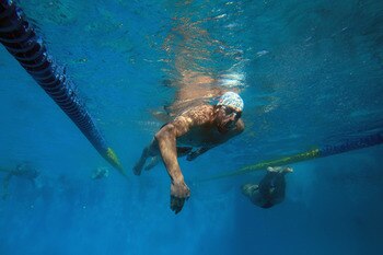 SANTA CLARA, CA - JUNE 19:  Michael Phelps warms up in the practice pool during day 4 of the Santa Clara International Grand Prix at George F. Haines International Swim Center on June 19, 2011 in Santa Clara, California.  (Photo by Ezra Shaw/Getty Images)