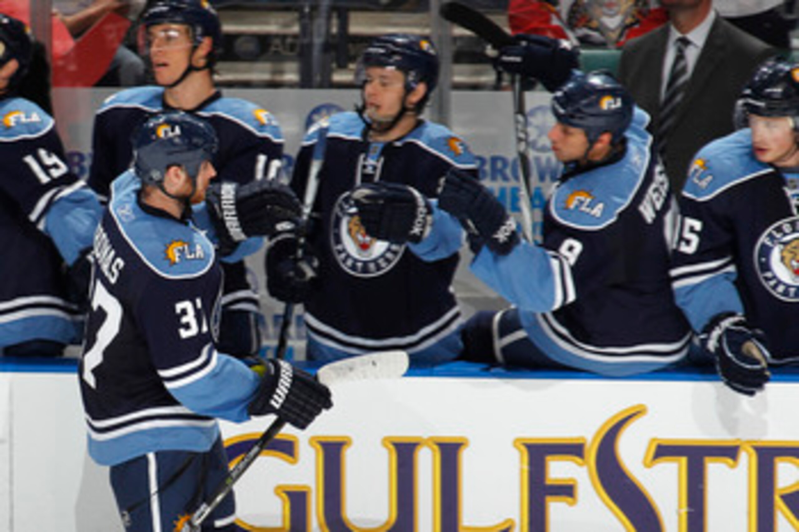 SUNRISE, FL - APRIL 9: Bill Thomas #37 of the Florida Panthers is congratulated after scoring the game winning goal against the Washington Capitals on April 9, 2011 at the BankAtlantic Center in Sunrise, Florida. The Panthers defeated the Capitals 1-0. (P