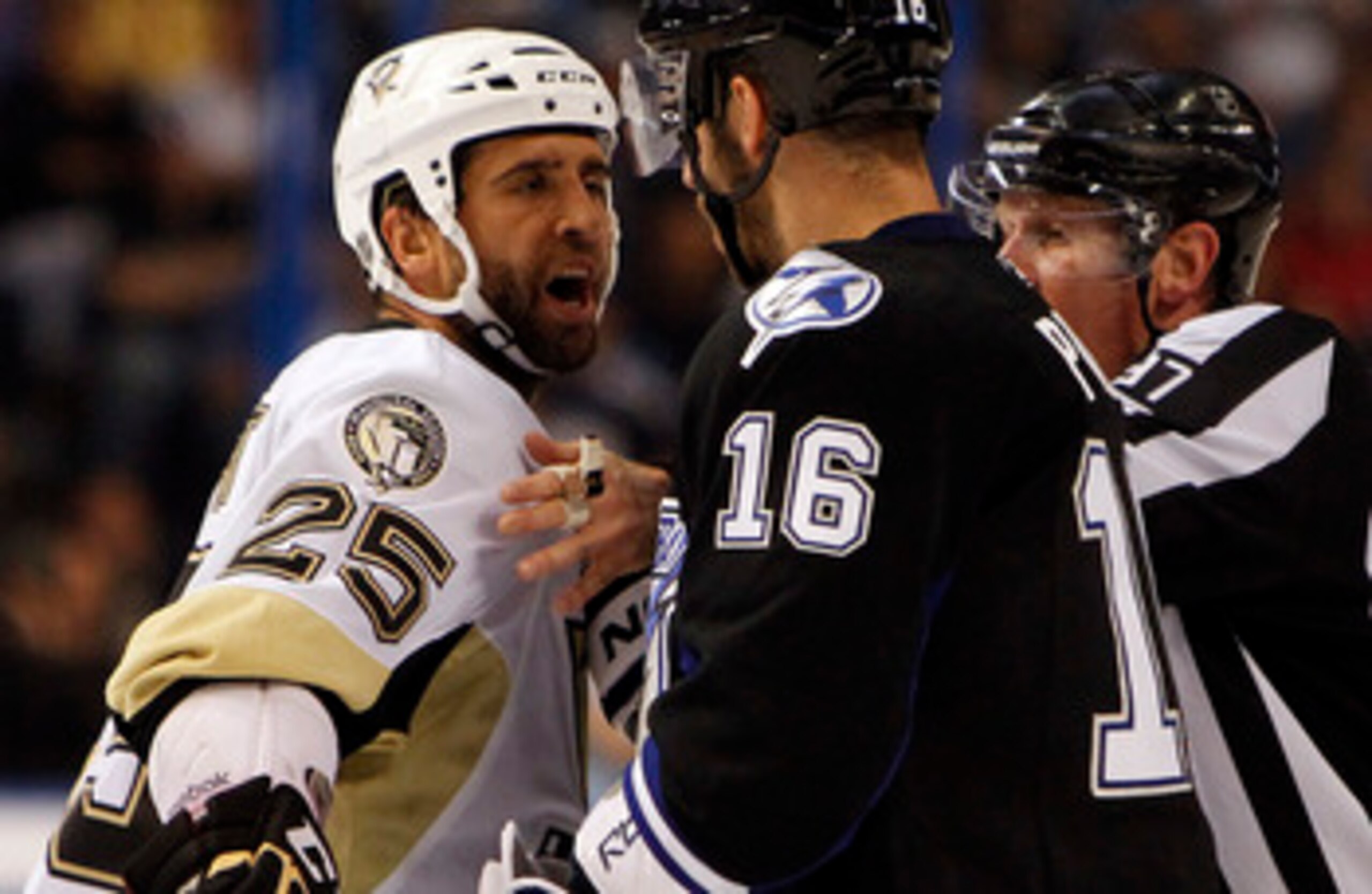 TAMPA, FL - APRIL 25: Maxime Talbot #25 of the Pittsburgh Penguins has a disagreement with Teddy Purcell #16 of the Tampa Bay Lightning in Game Six of the Eastern Conference Quarterfinals during the 2011 NHL Stanley Cup Playoffs at the St. Pete Times Foru