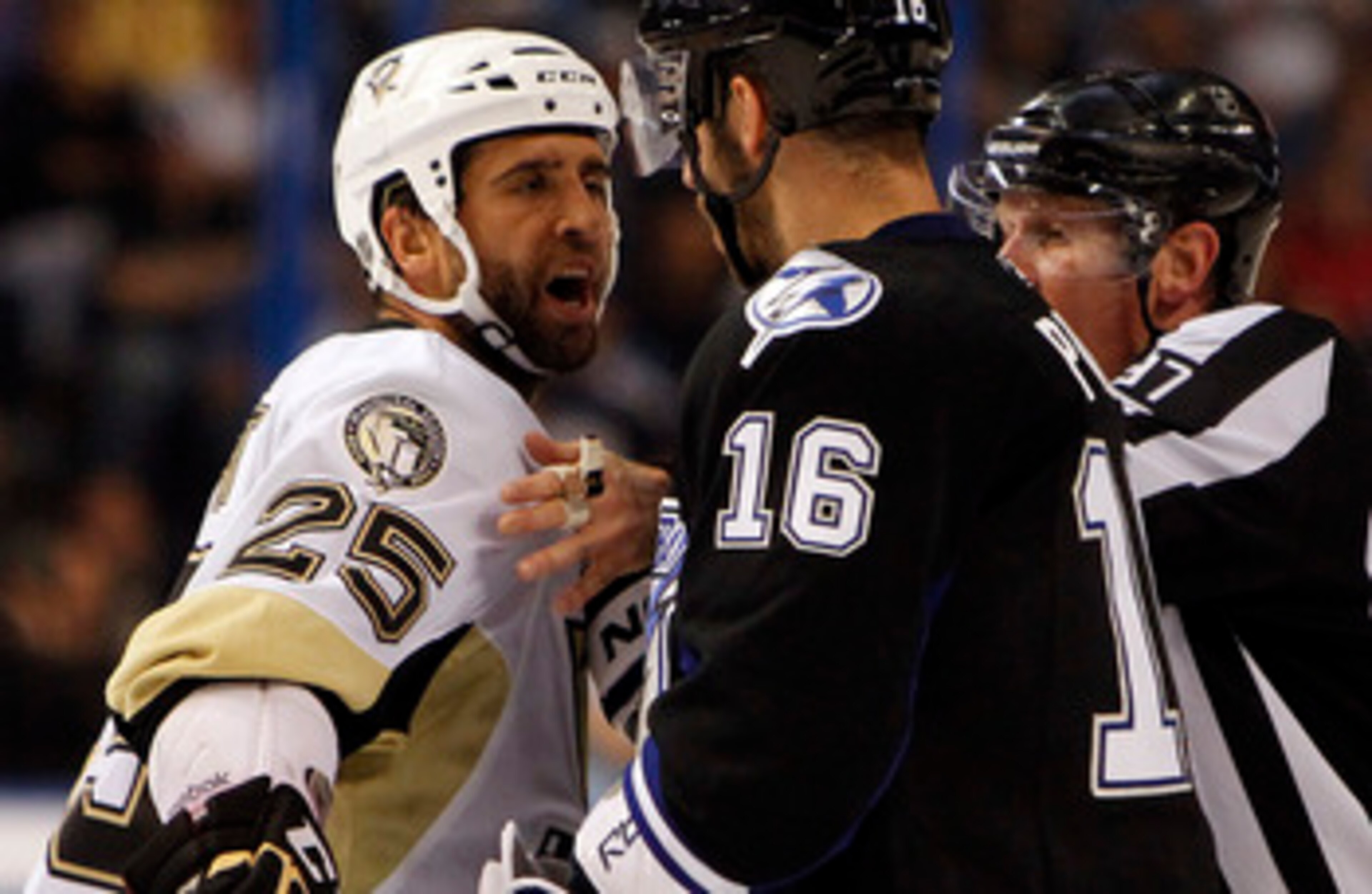 TAMPA, FL - APRIL 25: Maxime Talbot #25 of the Pittsburgh Penguins has a disagreement with Teddy Purcell #16 of the Tampa Bay Lightning in Game Six of the Eastern Conference Quarterfinals during the 2011 NHL Stanley Cup Playoffs at the St. Pete Times Foru