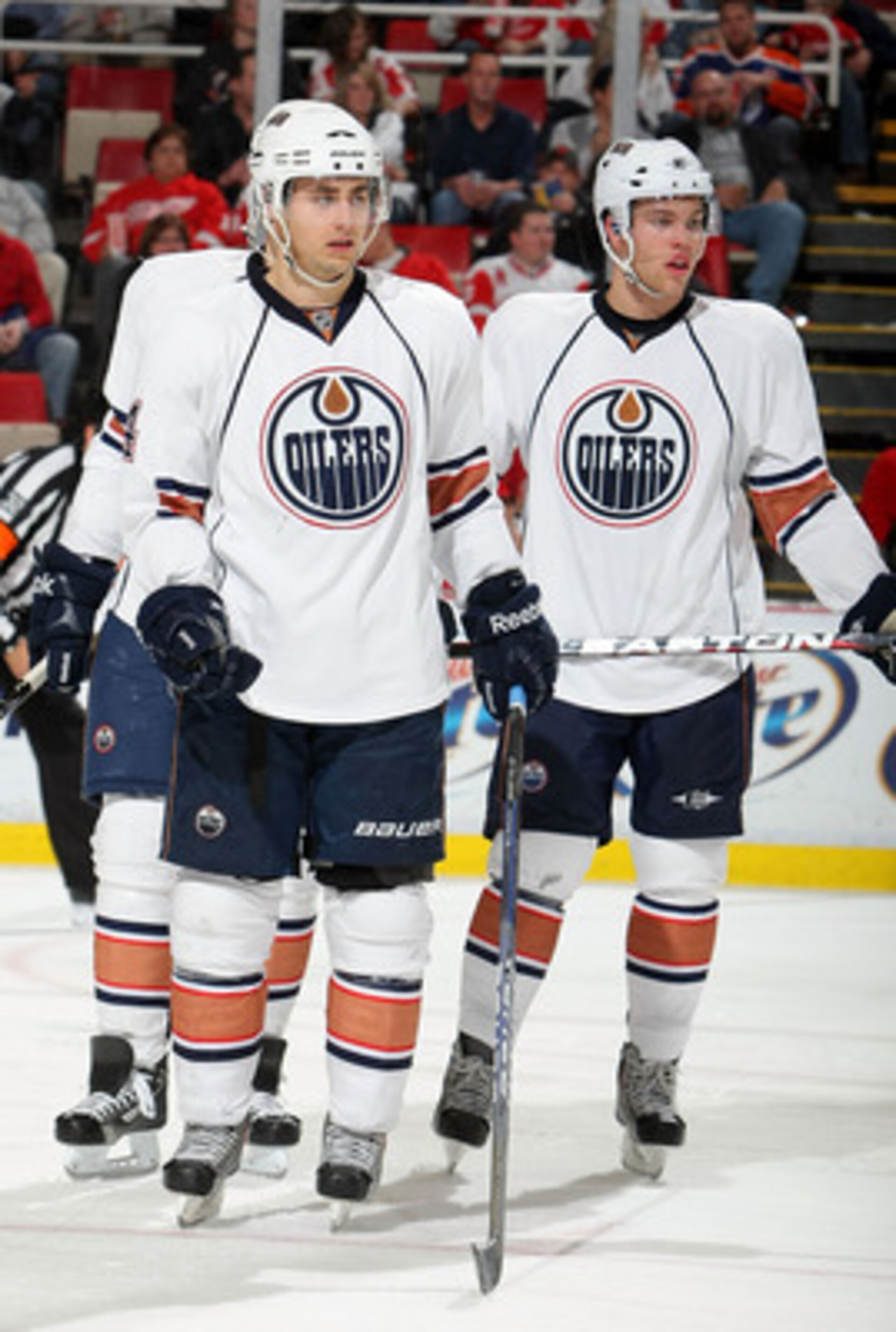 DETROIT - NOVEMBER 11:  Jordan Eberle #14 of the Edmonton Oilers and teammate Taylor Hall #4 prepare for a face-off against the Detroit Red Wings during their NHL game at Joe Louis Arena on November 11, 2010 in Detroit, Michigan.  (Photo by Dave Sandford/