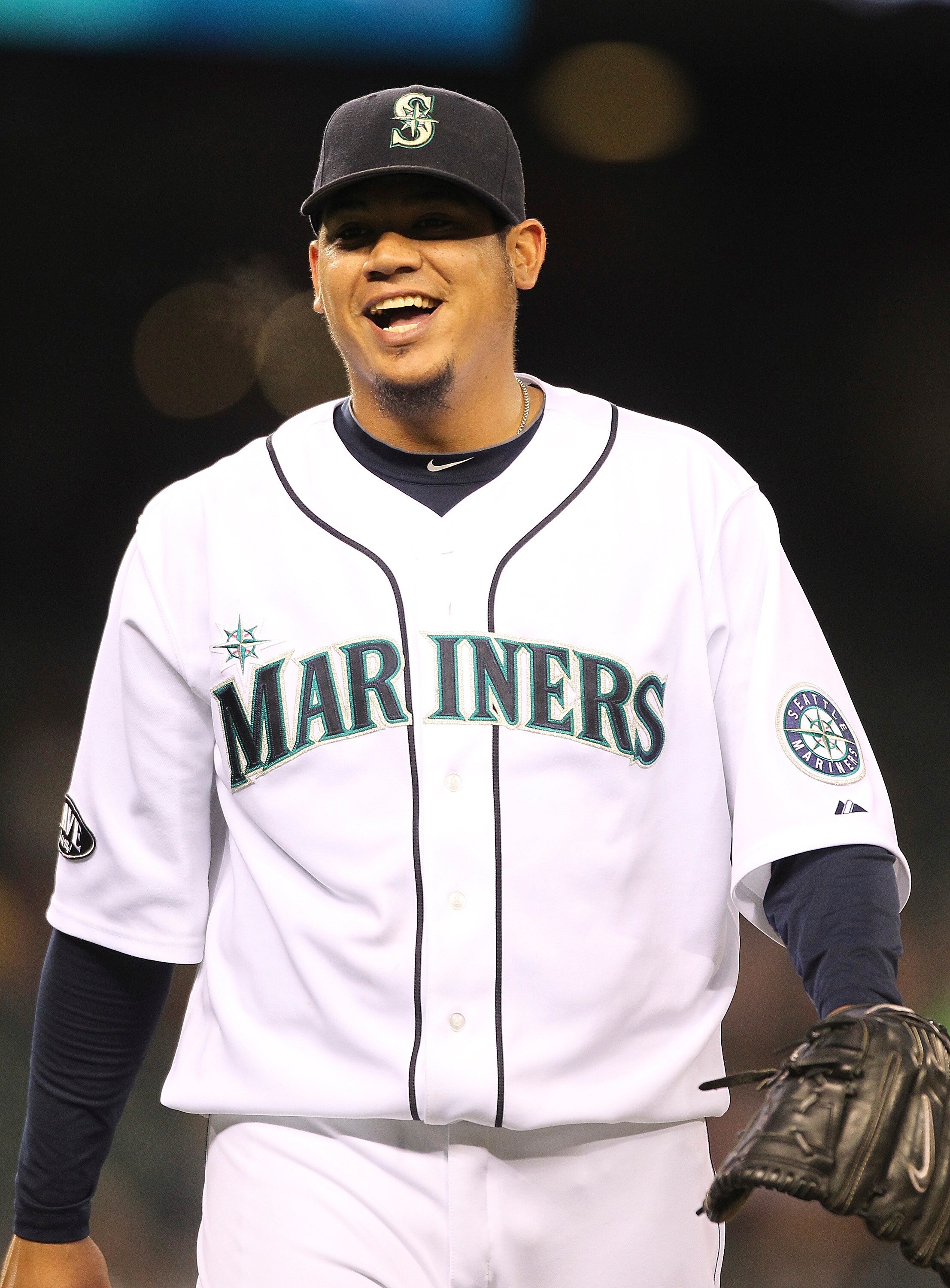 SEATTLE - JUNE 02:  Starting pitcher Felix Hernandez #34 of the Seattle Mariners smiles as he leaves the field in the seventh inning  against the Tampa Bay Rays at Safeco Field on June 2, 2011 in Seattle, Washington. (Photo by Otto Greule Jr/Getty Images)