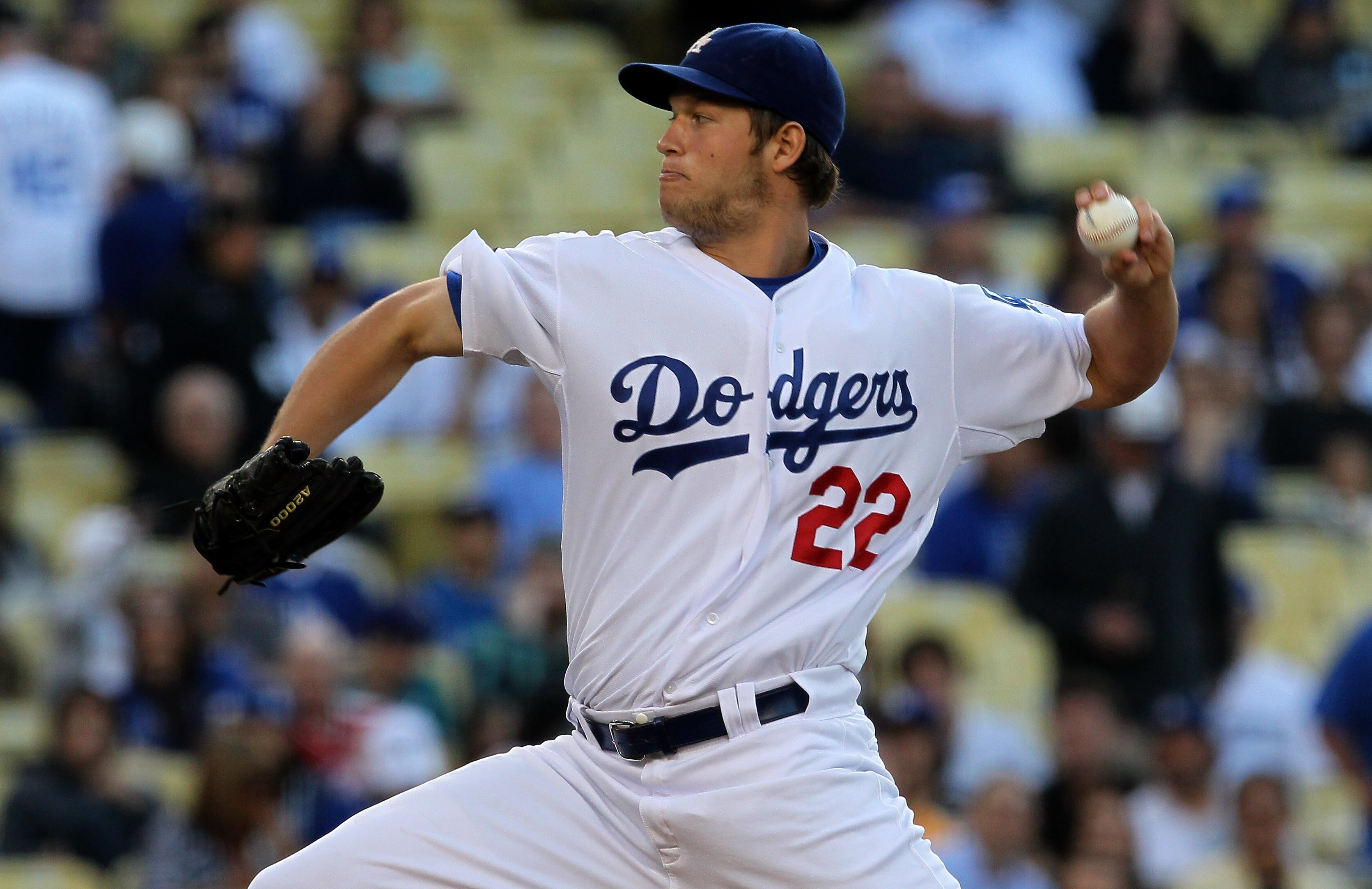 LOS ANGELES, CA - JUNE 14:  Clayton Kershaw #22 of the Los Angeles Dodgers throws a pitch against the Cincinnati Reds on June 14, 2011 at Dodger Stadium in Los Angeles, California.  (Photo by Stephen Dunn/Getty Images)