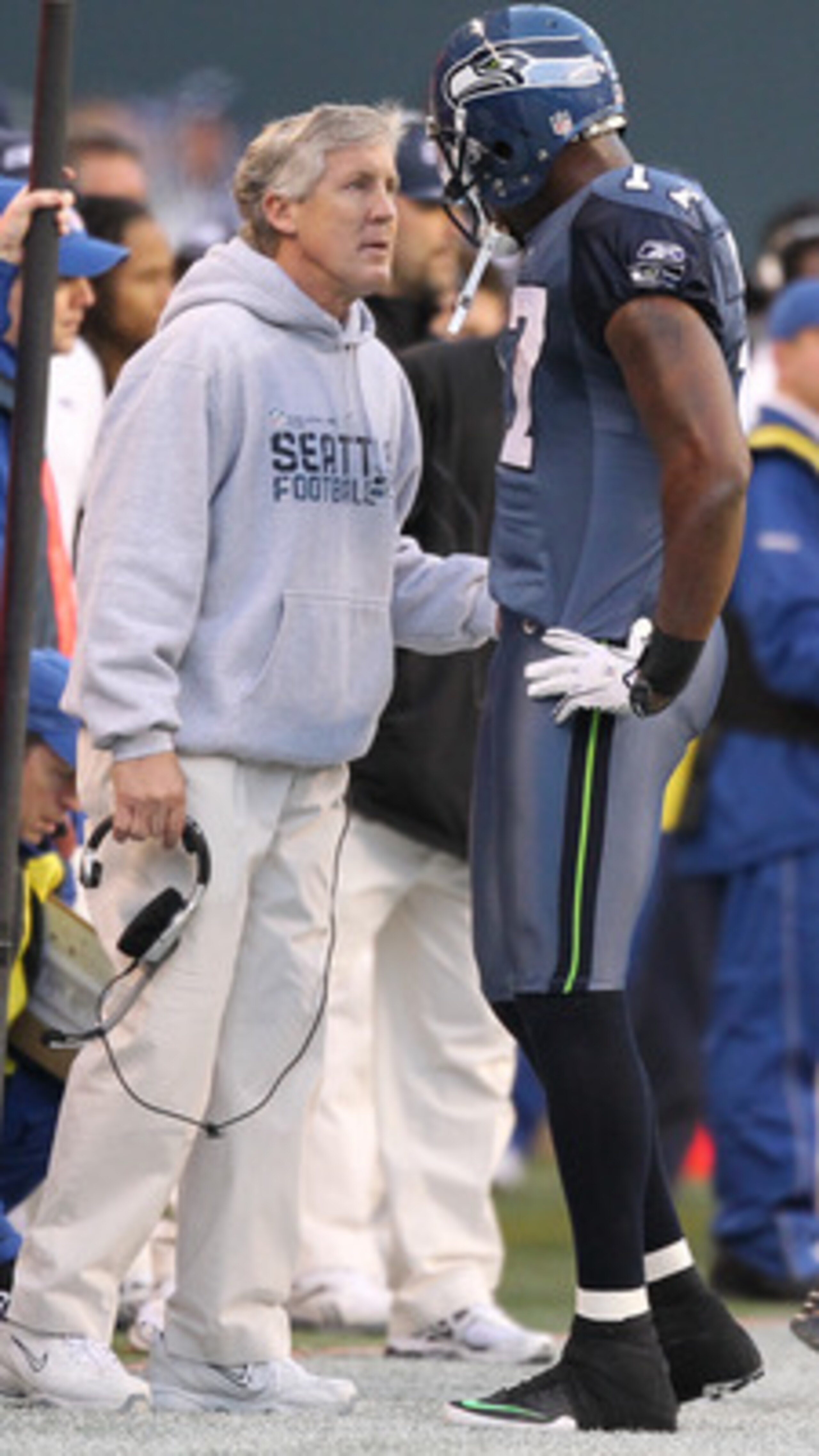 SEATTLE, WA - DECEMBER 19:  Head coach Pete Carroll of the Seattle Seahawks talks to wide receiver Mike Williams #17 during the game against the Atlanta Falcons at Qwest Field on December 19, 2010 in Seattle, Washington. (Photo by Otto Greule Jr/Getty Ima