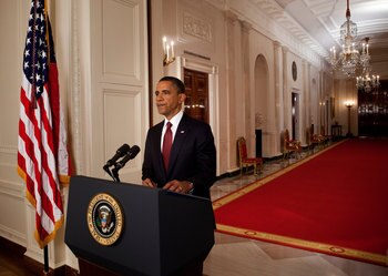 WASHINGTON, DC - MAY 1:  (AFP OUT) U.S. President Barack Obama stands after addressing the nation on TV from the East Room of the White House to make a televised statement May 1, 2011 in Washington, DC.  Bin Laden has been killed near Islamabad, Pakistan