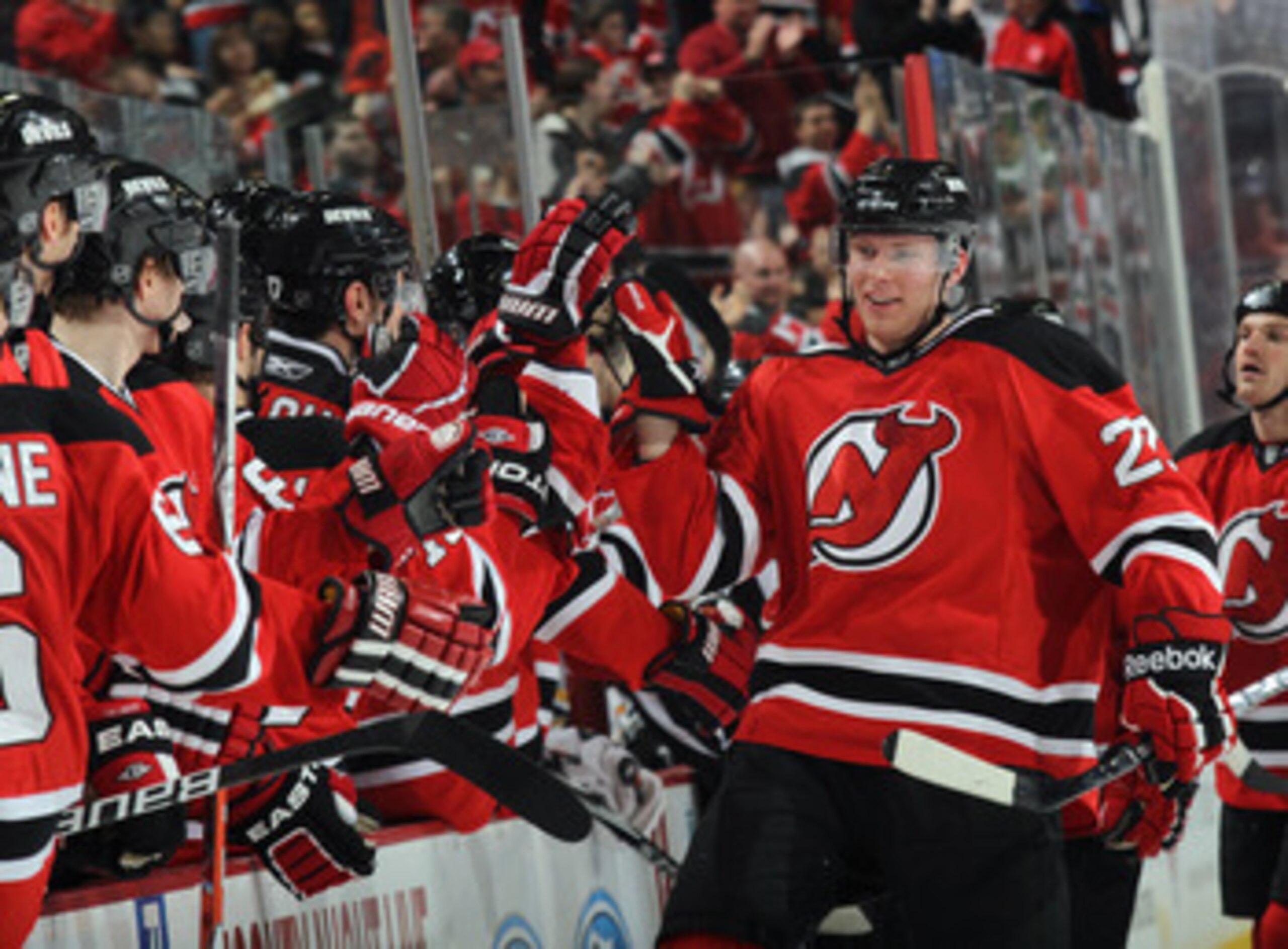 NEWARK, NJ - APRIL 10:  Alexander Urbom #22 of the New Jersey Devils celebrates his first NHL goal at 9:10 of the third period against the Boston Bruins at the Prudential Center on April 10, 2011 in Newark, New Jersey. The Devils defeated the Bruins 3-2.