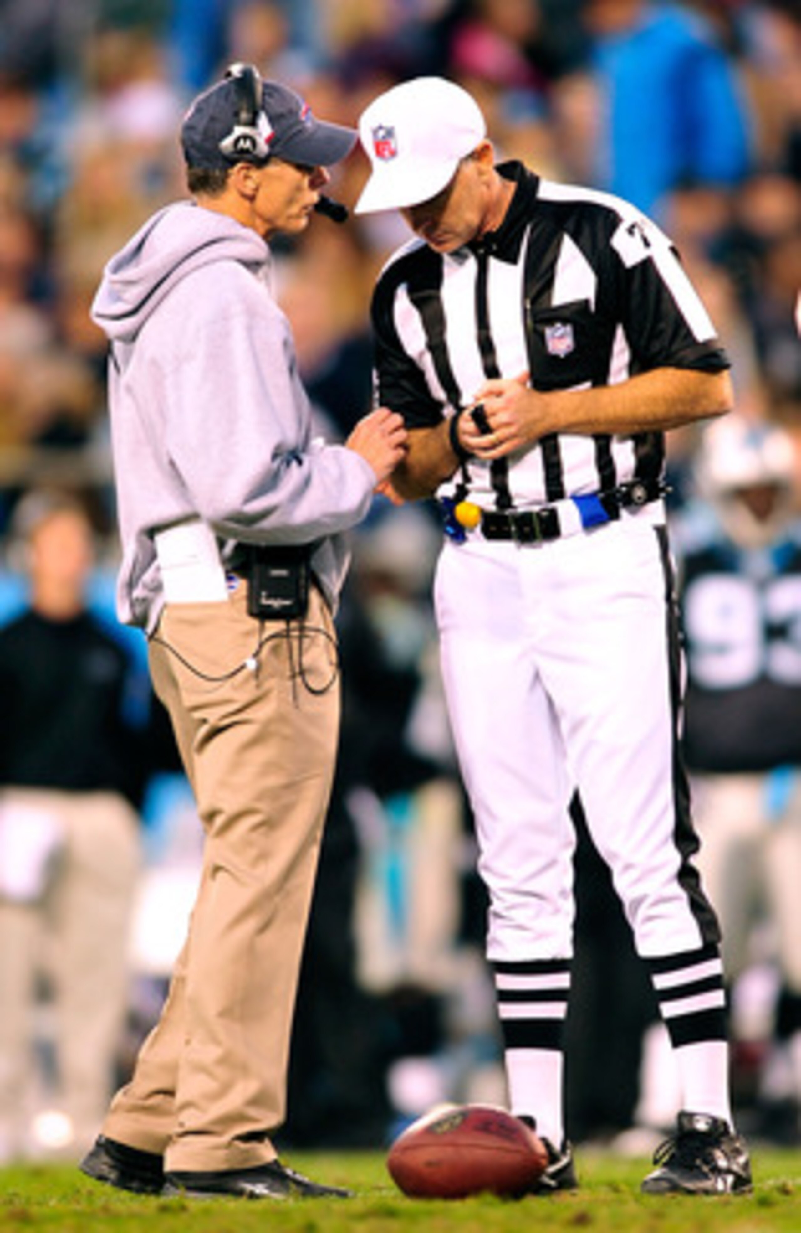 CHARLOTTE, NC - OCTOBER 25:  Coach Dick Jauron of the Buffalo Bills confers with an official during a game against the Carolina Panthers at Bank of America Stadium on October 25, 2009 in Charlotte, North Carolina. Buffalo won 20-9.  (Photo by Grant Halver
