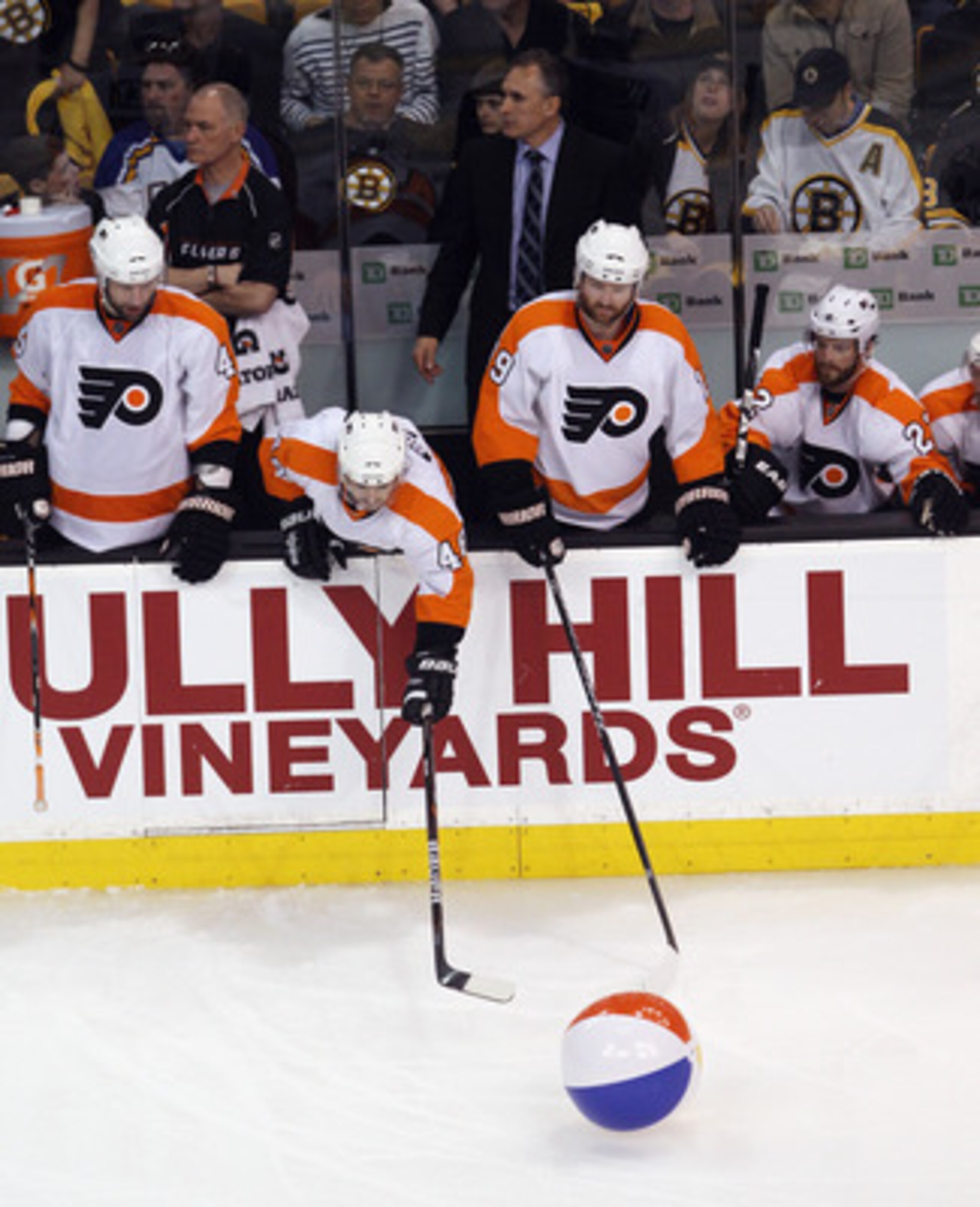 BOSTON, MA - MAY 06:  BOSTON, MA - MAY The Philadelphia Flyers try to capture a ball that was tossed on the ice in the third period against the Boston Bruins in Game Four of the Eastern Conference Semifinals during the 2011 NHL Stanley Cup Playoffs at TD