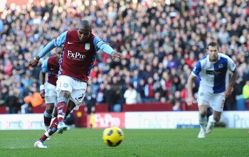 BIRMINGHAM, ENGLAND - FEBRUARY 26:  Ashley Young of Aston Villa scores from the penalty spot during the Barclays Premier League match between Aston Villa and Blackburn Rovers at Villa Park on February 26, 2011 in Birmingham, England.  (Photo by Laurence G