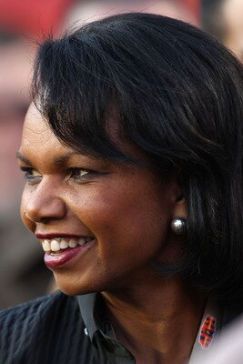 MIAMI GARDENS, FL - FEBRUARY 07:  Former Secretary of State Condoleezza Rice watches warms-ups on the field prior to the start of Super Bowl XLIV between the Indianapolis Colts and the New Orleans Saints on February 7, 2010 at Sun Life Stadium in Miami Ga
