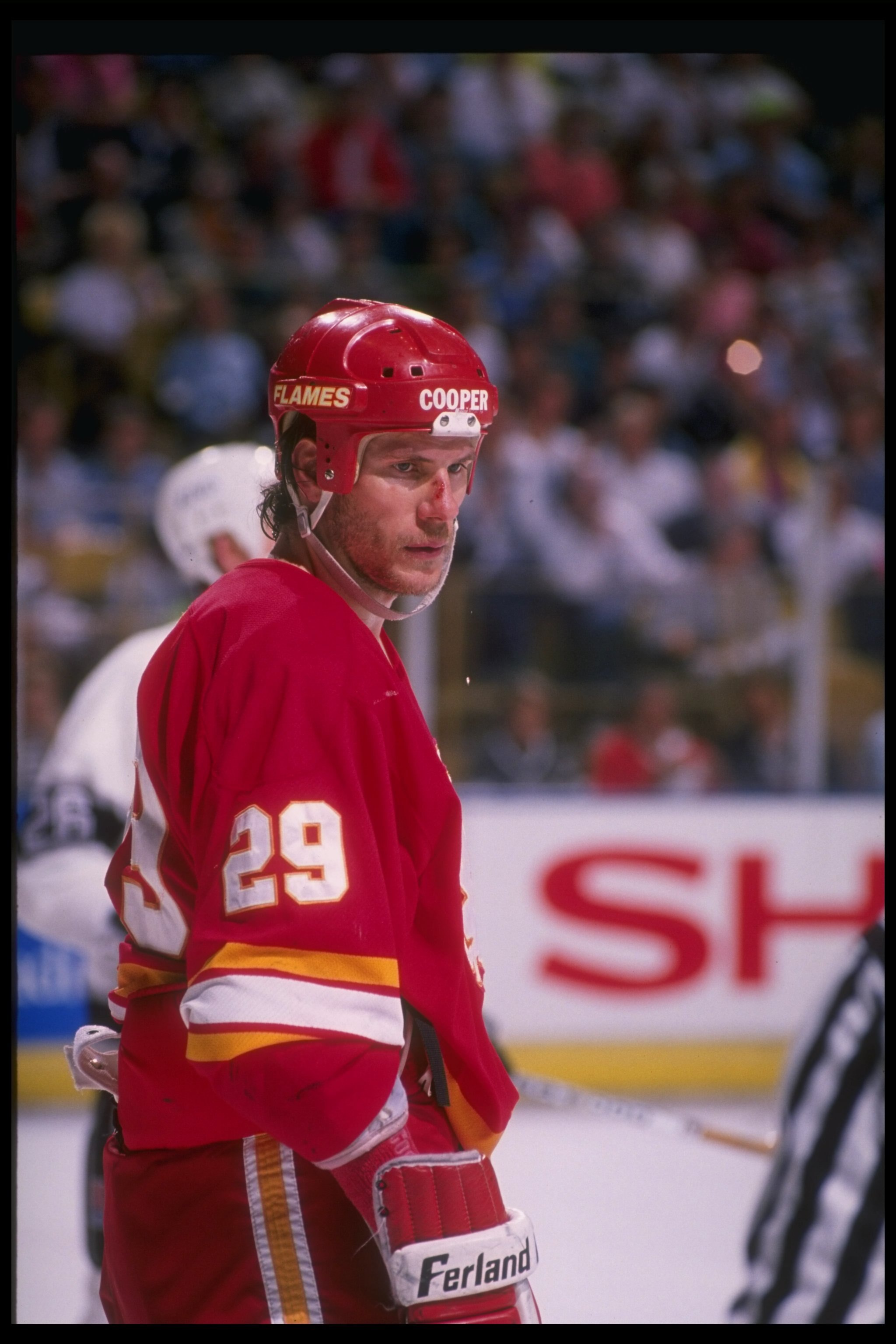 1989-1990:  Center Joel Otto of the Calgary Flames looks on during a playoff game against the Los Angeles Kings at the Olympic Saddledome in Calgary, Alberta. Mandatory Credit: Mike Powell  /Allsport