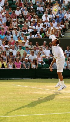 WIMBLEDON, ENGLAND - JUNE 29:  Radek Stepanek of Czech Republic serves during the men's singles fourth round match against Lleyton Hewitt of Australia on Day Seven of the Wimbledon Lawn Tennis Championships at the All England Lawn Tennis and Croquet Club 