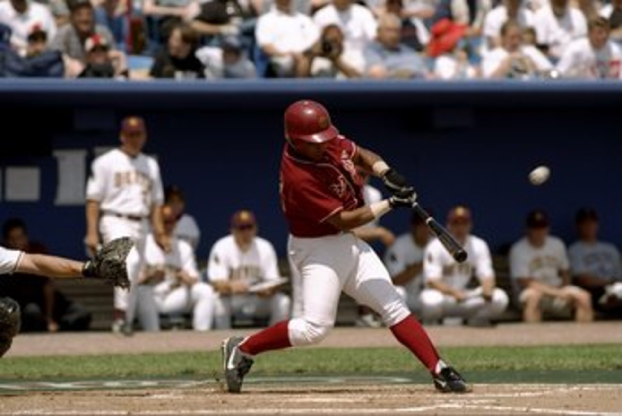 6 Jun 1998:  Wes Rachels #24 of the USC Trojans swings during the College World Series game against  the  Arizona State Sun Devils at Rosenblatt Stadium in Omaha, Nebraska. USC defeated ASU 21-14Mandatory Credit: Vincent Laforet  /Allsport