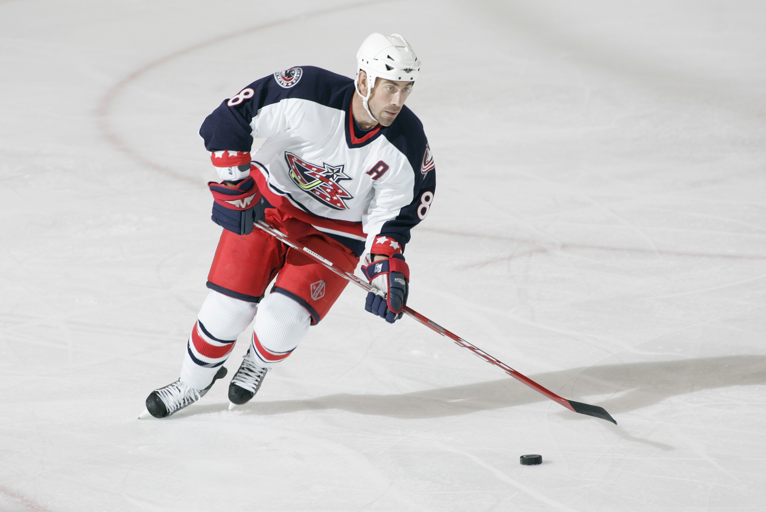 PITTSBURGH - SEPTEMBER 27:  Geoff Sanderson #8 of the Columbus Blue Jackets skates with the puck against the Pittsburgh Penguins during a preseason NHL game at Mellon Arena on September 27, 2005 in Pittsburgh, Pennsylvania. (Photo By Gregory Shamus/Getty