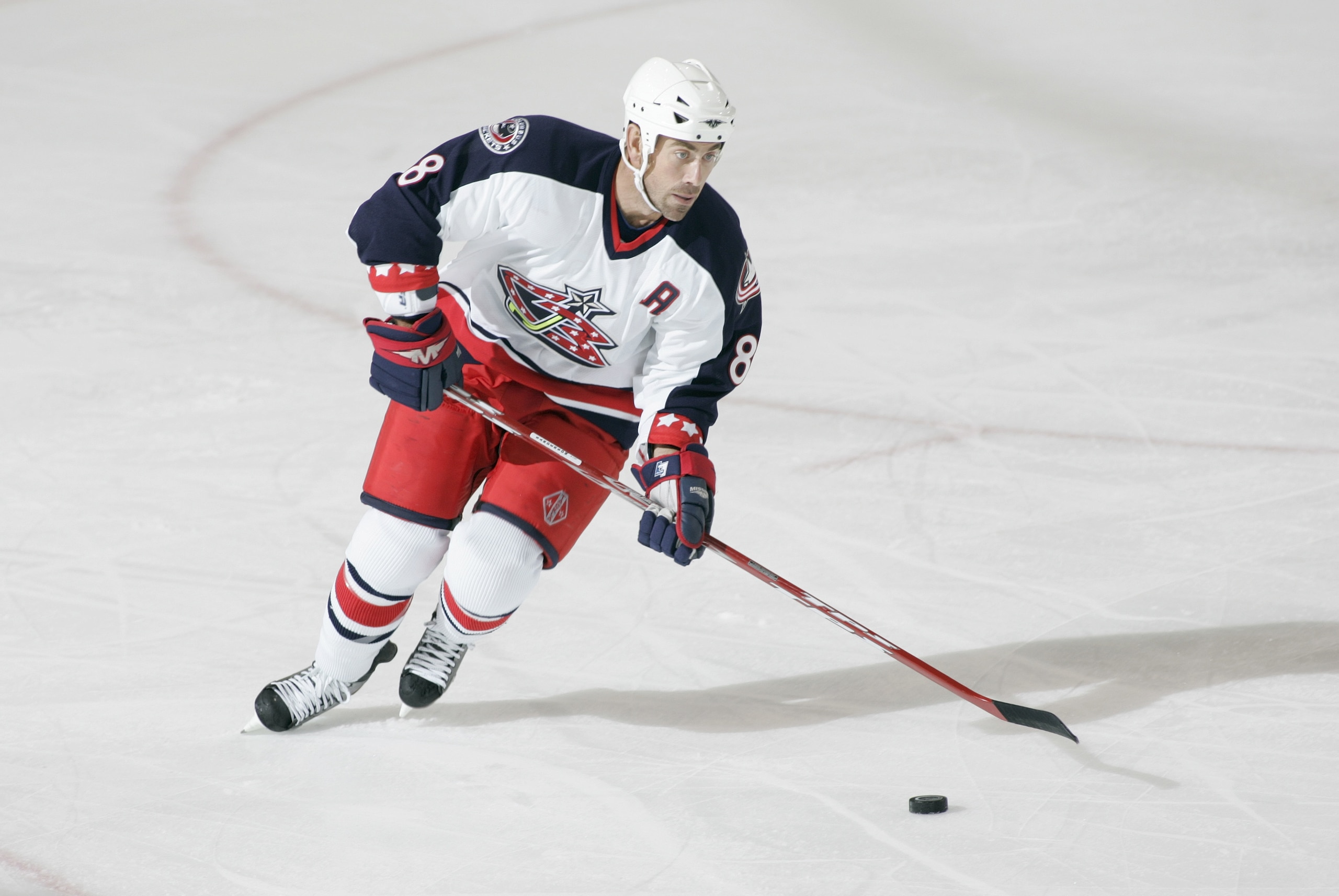 PITTSBURGH - SEPTEMBER 27:  Geoff Sanderson #8 of the Columbus Blue Jackets skates with the puck against the Pittsburgh Penguins during a preseason NHL game at Mellon Arena on September 27, 2005 in Pittsburgh, Pennsylvania. (Photo By Gregory Shamus/Getty