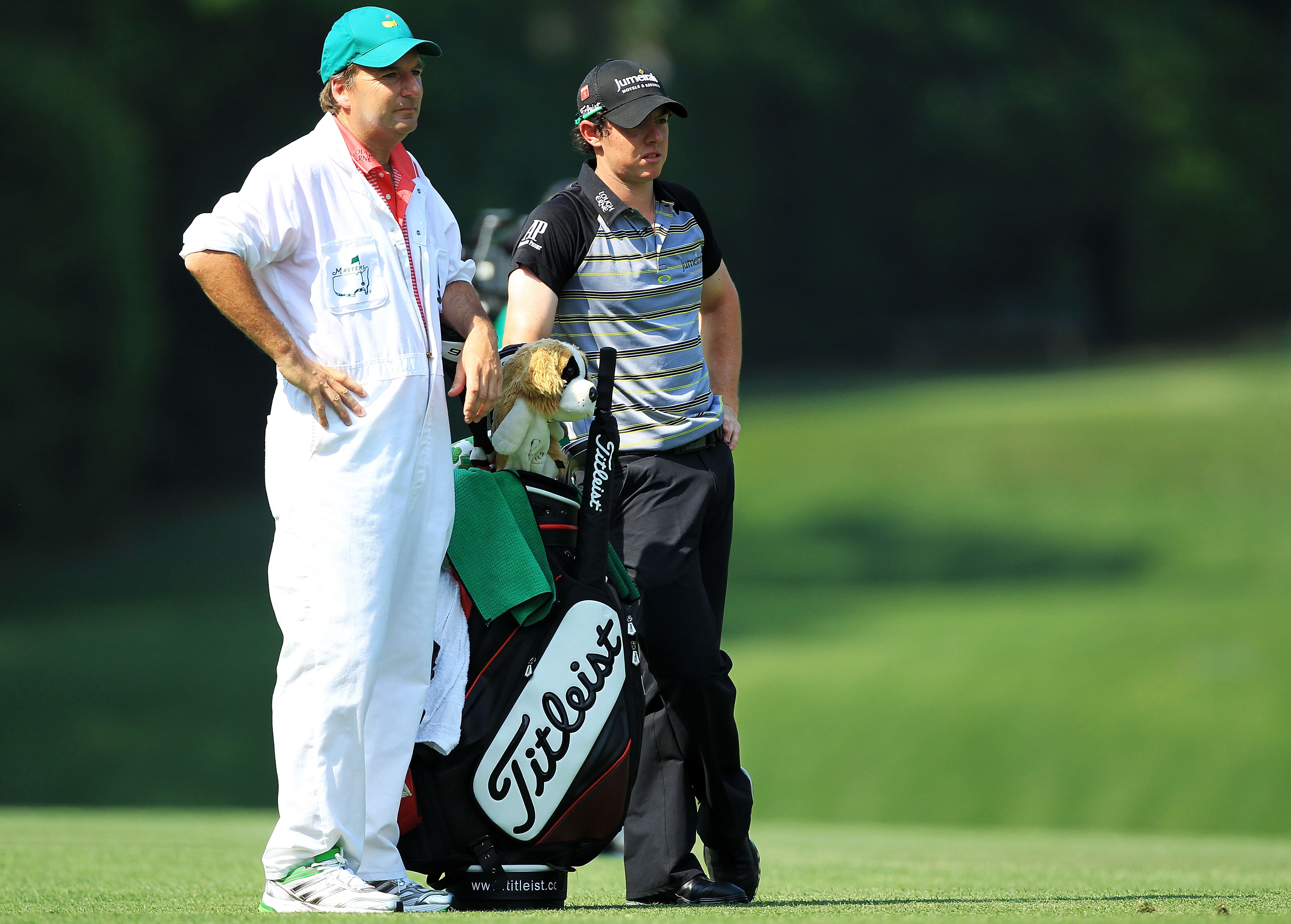 AUGUSTA, GA - APRIL 10:  Rory McIlroy of Northern Ireland (R) and caddie J.P. Fitzgerald look on during the final round of the 2011 Masters Tournament on April 10, 2011 in Augusta, Georgia.  (Photo by David Cannon/Getty Images)