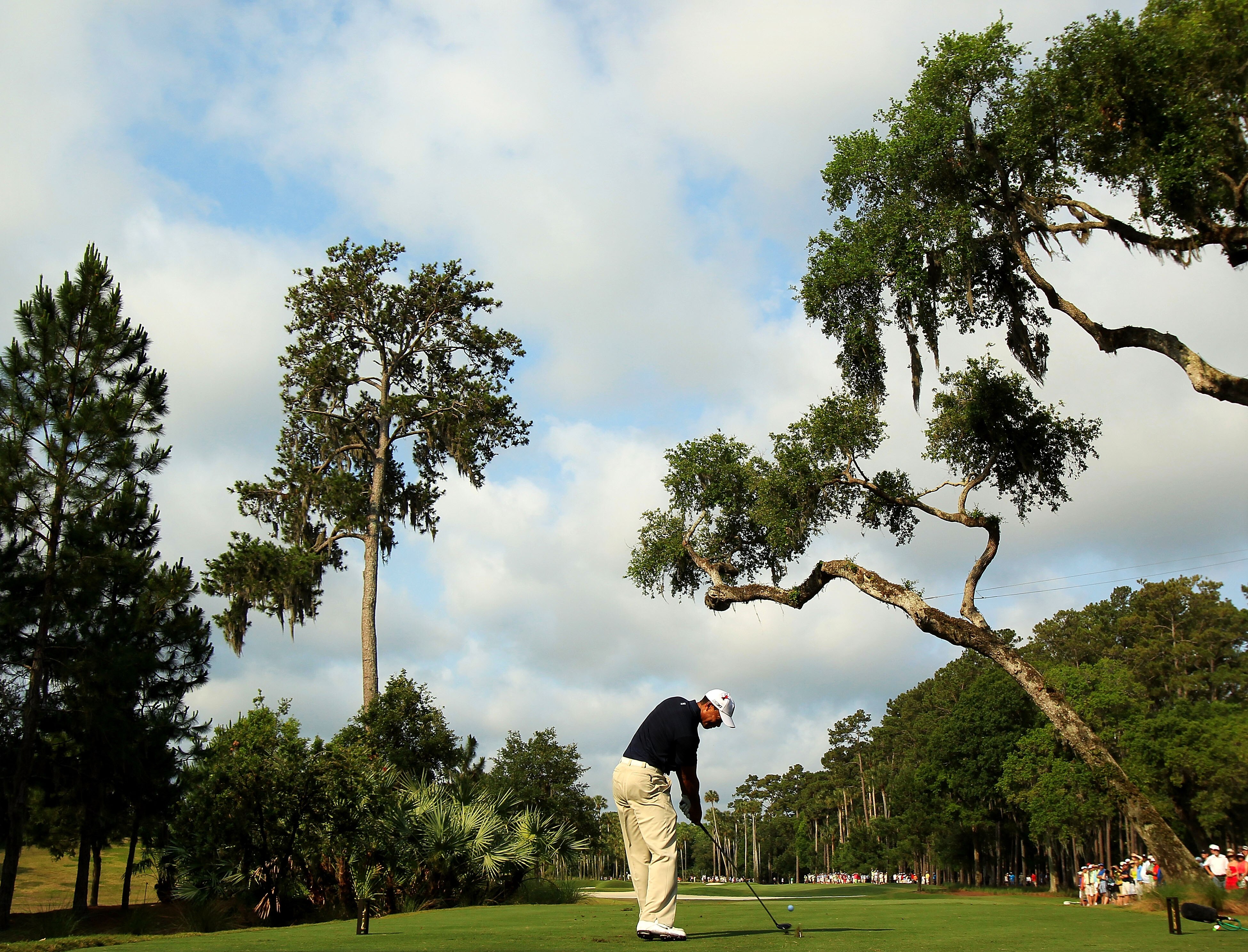 PONTE VEDRA BEACH, FL - MAY 12:  Tiger Woods hits his tee shot on the sixth hole during the first round of THE PLAYERS Championship held at THE PLAYERS Stadium course at TPC Sawgrass on May 12, 2011 in Ponte Vedra Beach, Florida. Woods withdrew after shoo