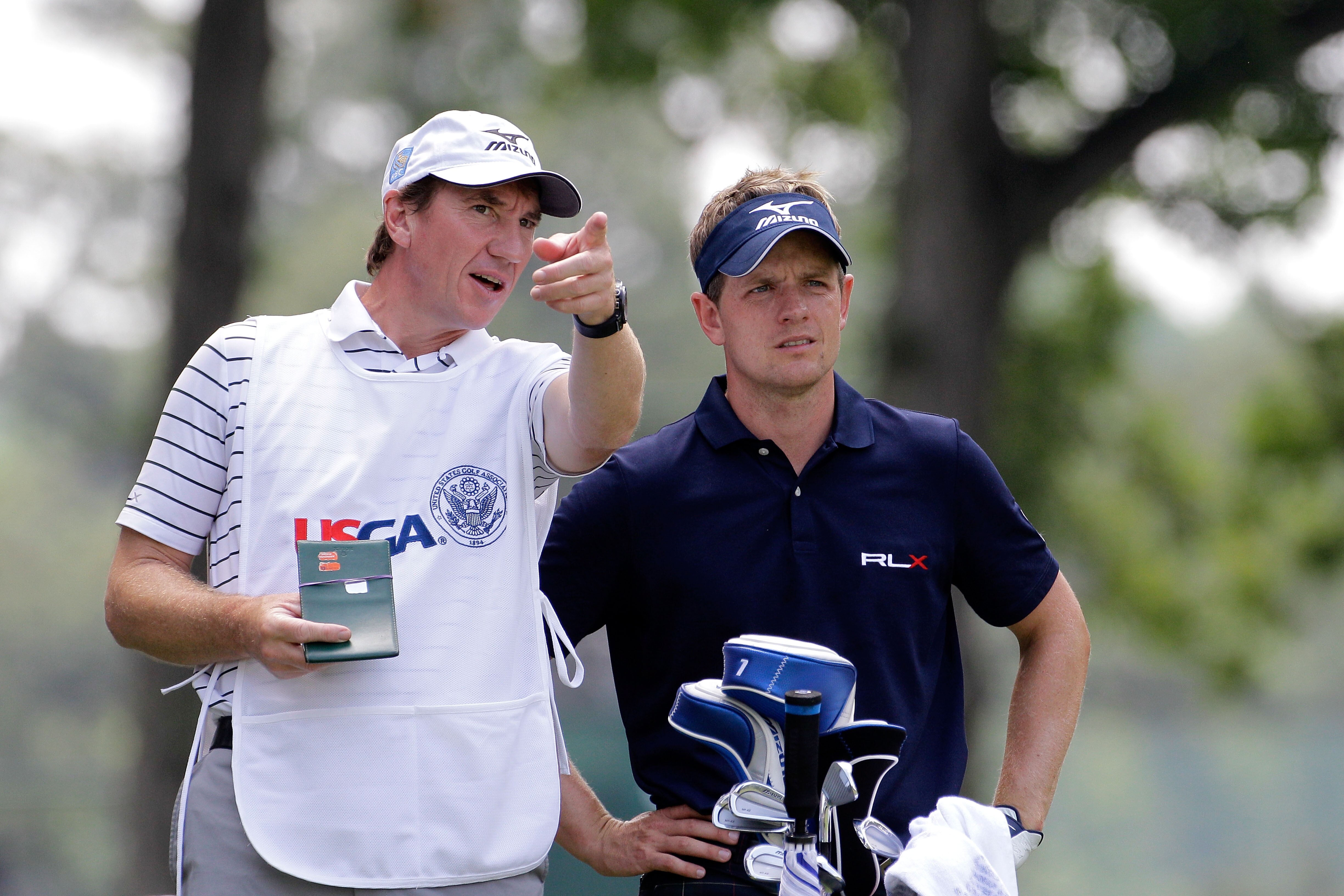 BETHESDA, MD - JUNE 18:  Luke Donald of England (R) and caddie John McLaren (L) look on from the fourth tee during the third round of the 111th U.S. Open at Congressional Country Club on June 18, 2011 in Bethesda, Maryland.  (Photo by Rob Carr/Getty Image