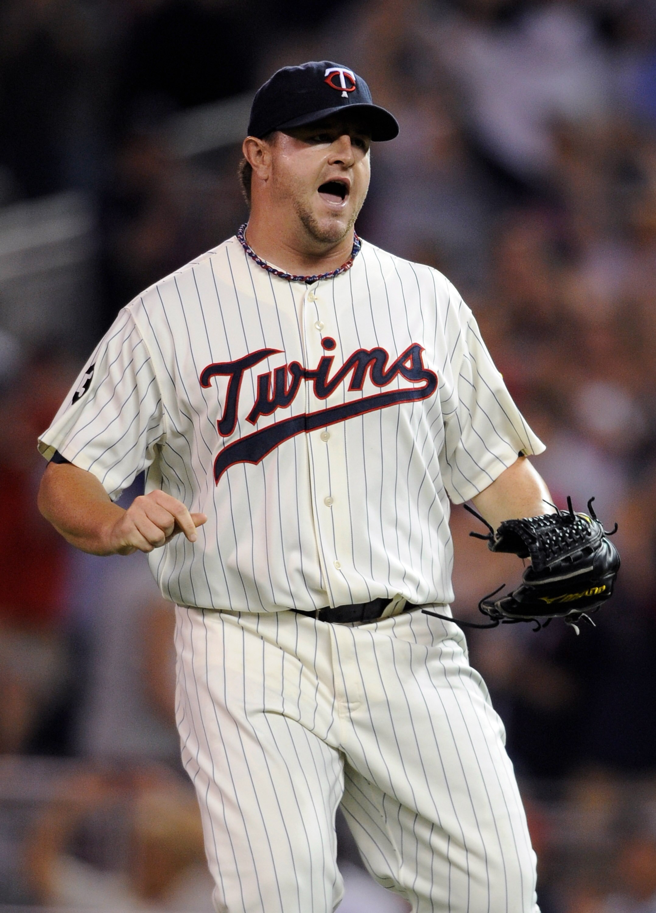 MINNEAPOLIS, MN - JUNE 17: Matt Capps #55 of the Minnesota Twins celebrates a win against the San Diego Padres after the game on June 17, 2011 at Target Field in Minneapolis, Minnesota. The Twins defeated the Padres 6-5. (Photo by Hannah Foslien/Getty Ima