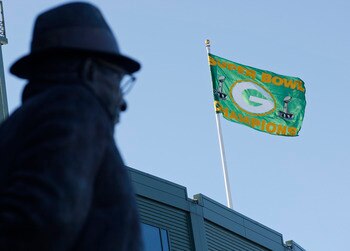 GREEN BAY, WI - FEBRUARY 08:  A Green Bay Packers Super Bowl Champion flag flies over Lambeau Field on February 8, 2011 in Green Bay, Wisconsin.  (Photo by Matt Ludtke/Getty Images)