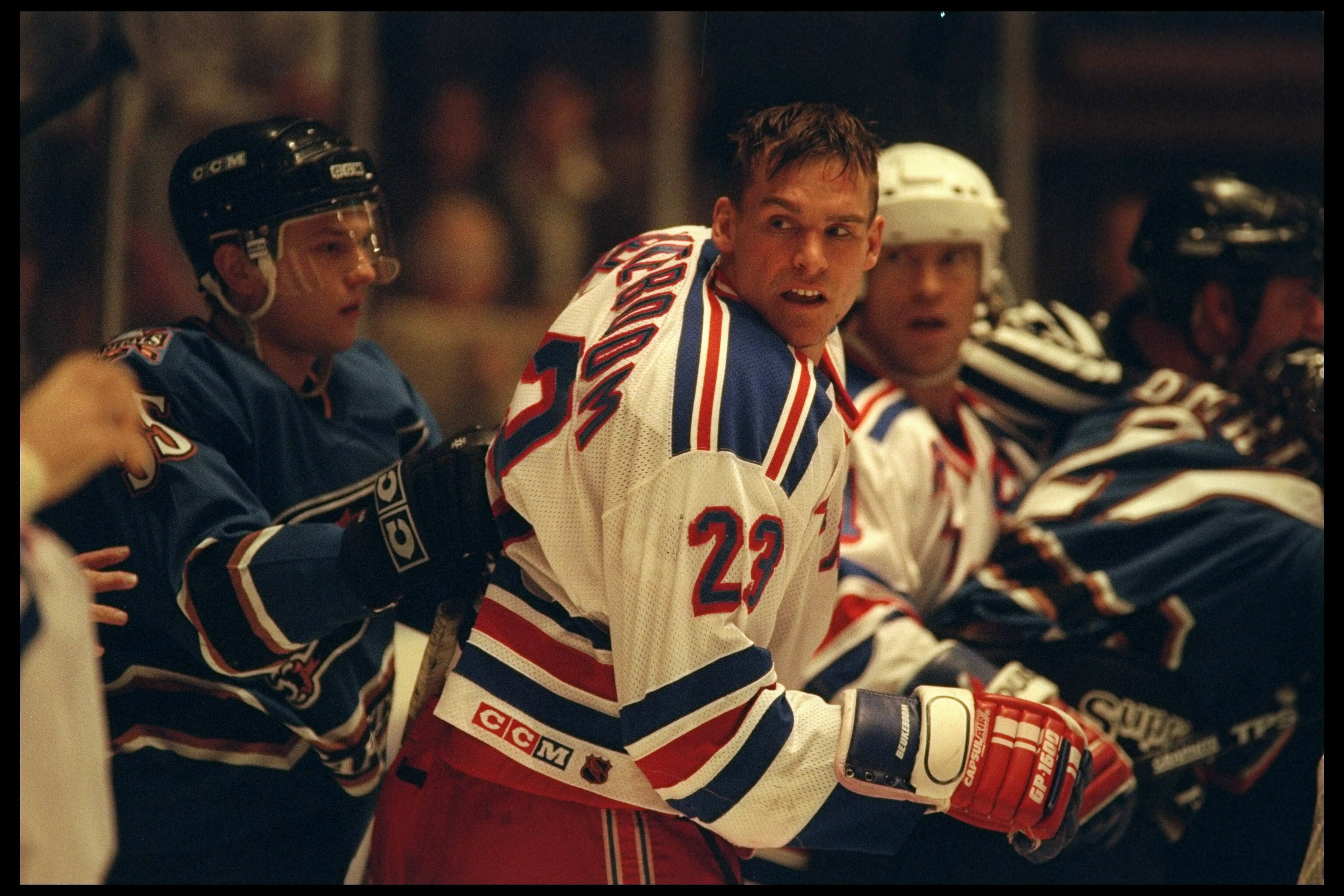 18 Dec 1995: Defenseman Sergei Gonchar of the Washington Capitals and defenseman Jeff Beukeboom of the New York Rangers look on during a game played at Madison Square Garden in New York, New York. The Rangers won the game, 3-0.