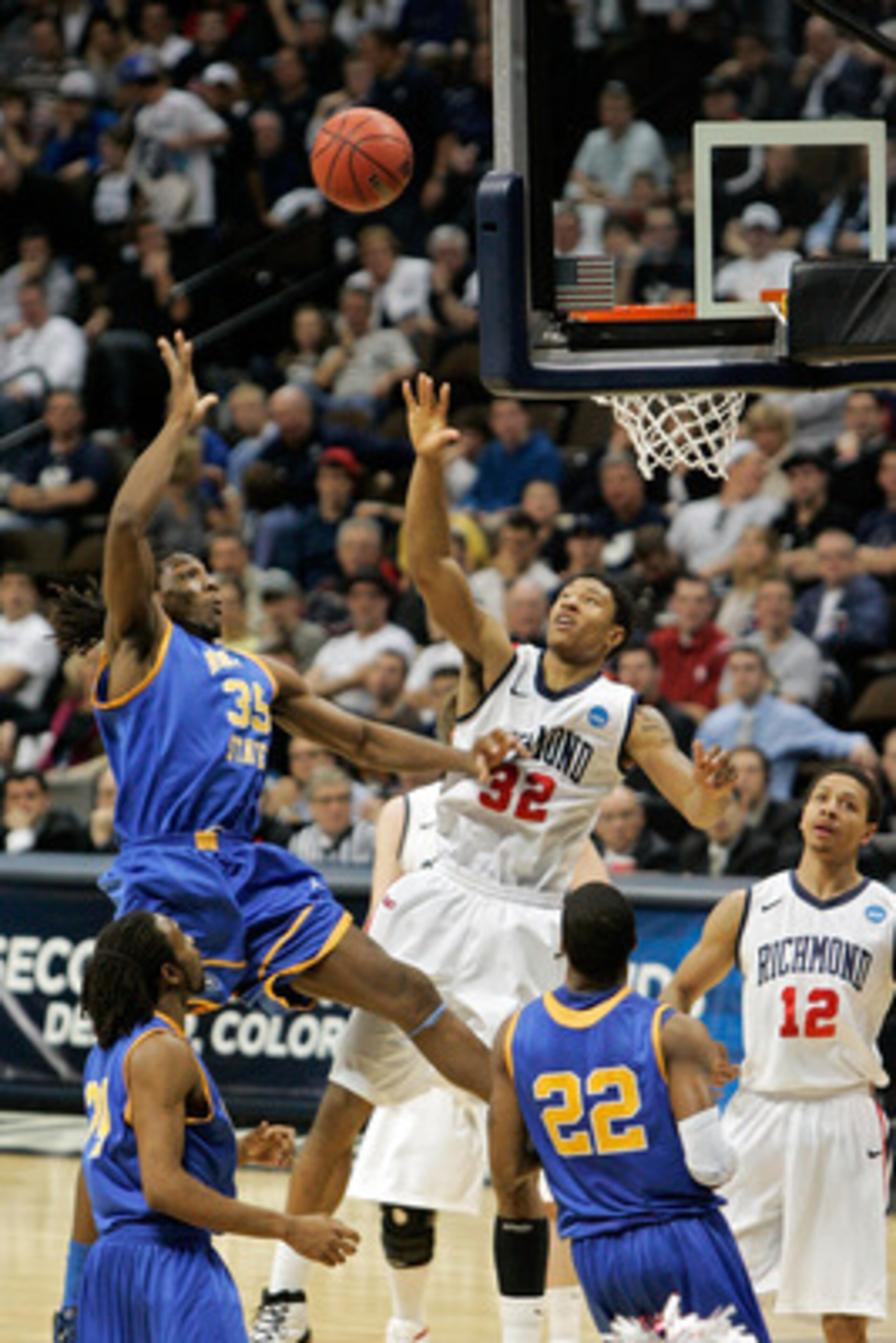DENVER, CO - MARCH 19:  Kenneth Faried #35 of the Morehead State Eagles shoots over Justin Harper #32 of the Richmond Spiders during the third round of the 2011 NCAA men's basketball tournament at Pepsi Center on March 19, 2011 in Denver, Colorado.  (Phot
