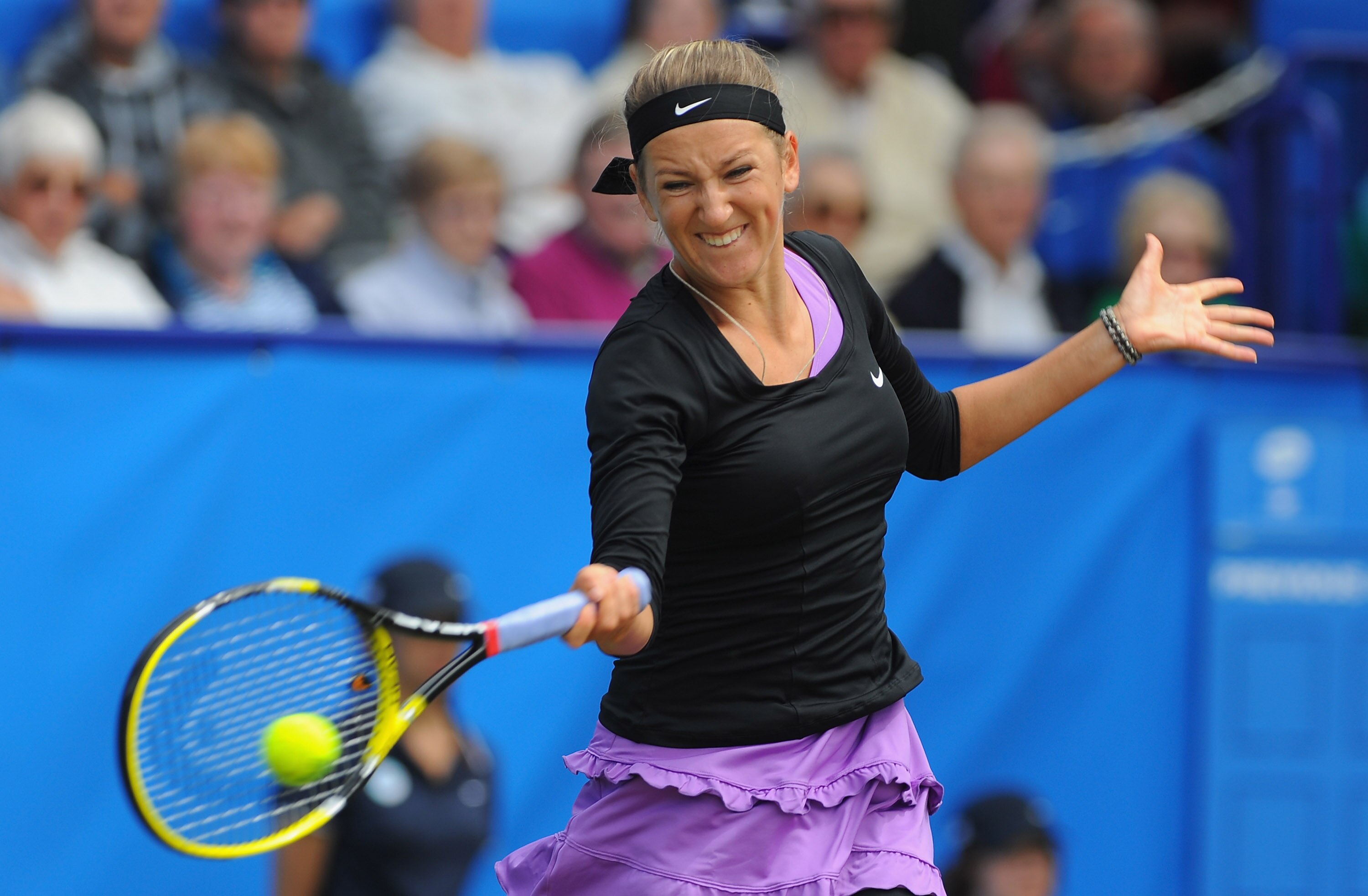 EASTBOURNE, ENGLAND - JUNE 15:  Victoria Azarenka of Belarus in action against Elena Baltacha of Great Britain during day five of the AEGON International at Devonshire Park on June 15, 2011 in Eastbourne, England.  (Photo by Mike Hewitt/Getty Images)