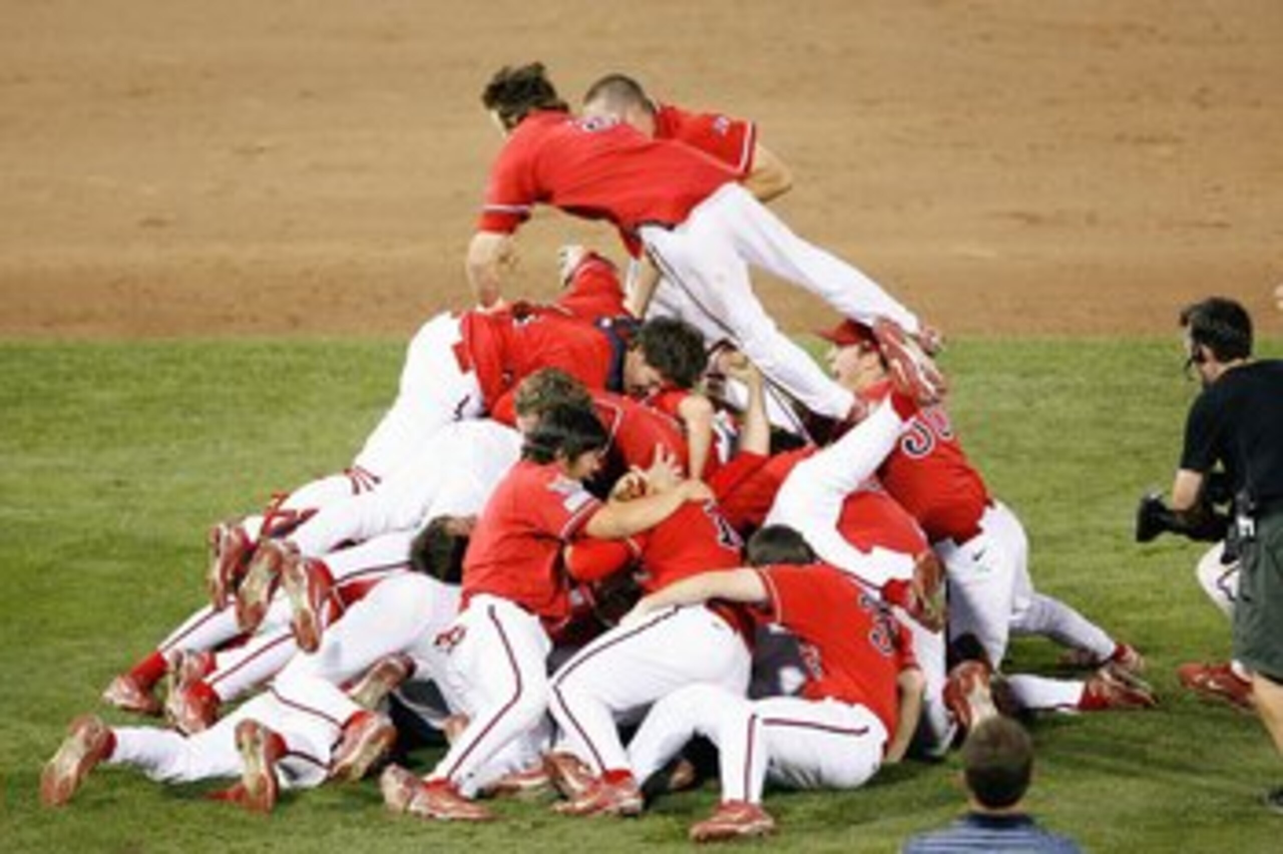 OMAHA, NE - JUNE 25:  The Fresno State Bulldogs celebrates their win on the mound against the Georgia Bulldogs during Game 3 of the 2008 Men's College World Series Championship June 25, 2008 at Rosenblatt Stadium in Omaha, Nebraska.  (Photo by Kevin C. Co