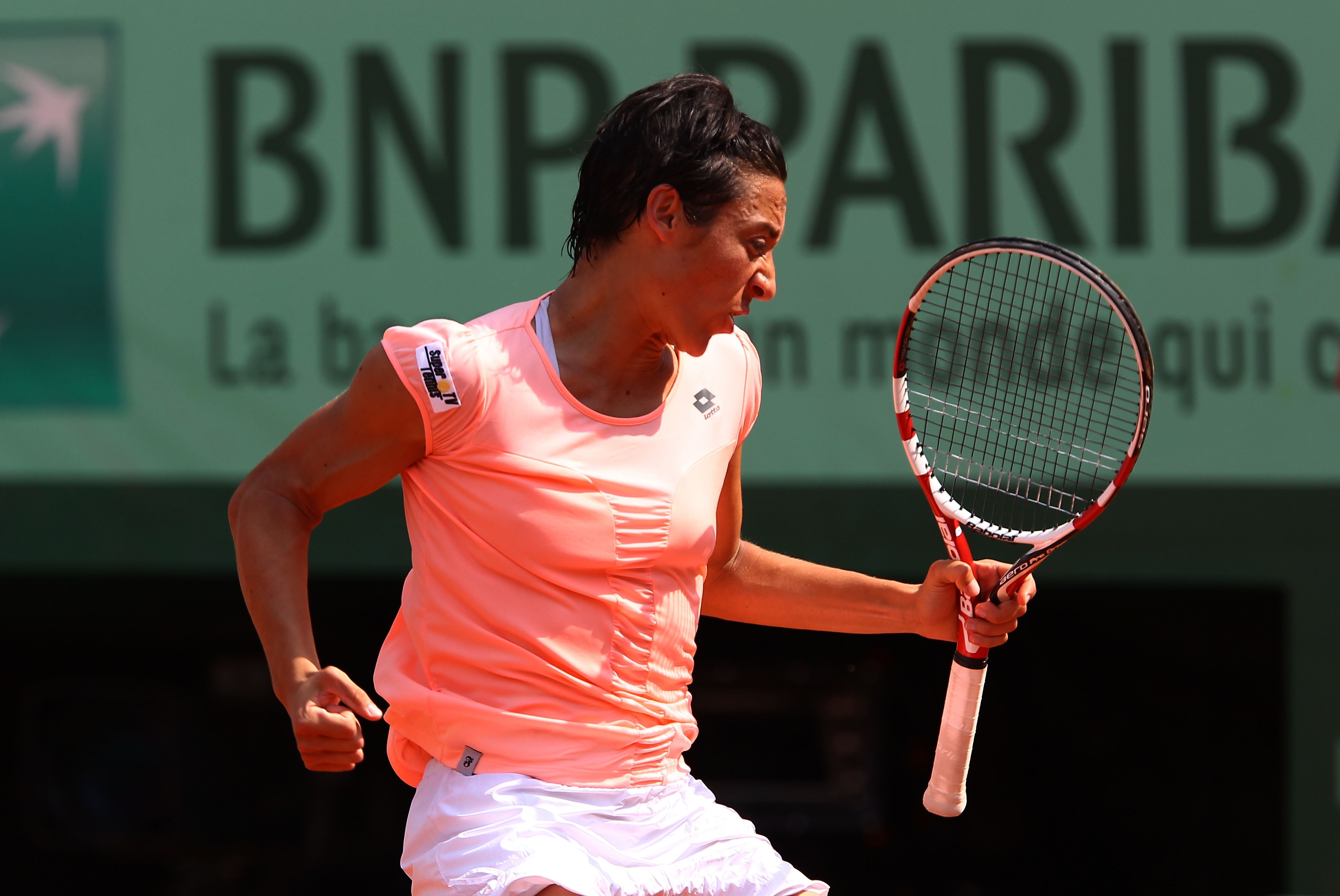 PARIS, FRANCE - JUNE 04:  Francesca Schiavone of Italycelebrates a point during the women's singles final match between Francesca Schiavone of Italy and Na Li of China on day fourteen of the French Open at Roland Garros on June 4, 2011 in Paris, France.