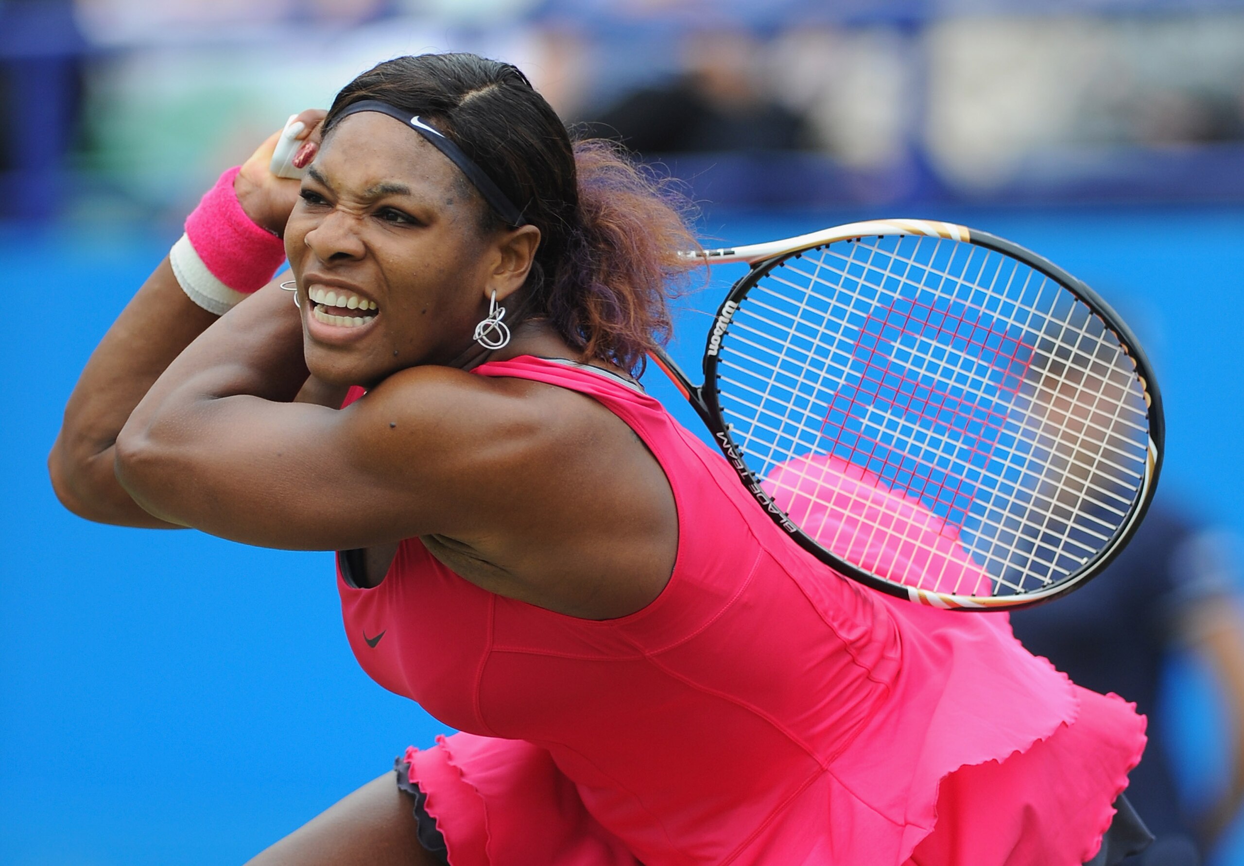 EASTBOURNE, ENGLAND - JUNE 15:  Serena Williams of USA in action against Vera Zvonareva of Russia during day five of the AEGON International at Devonshire Park on June 15, 2011 in Eastbourne, England.  (Photo by Mike Hewitt/Getty Images)