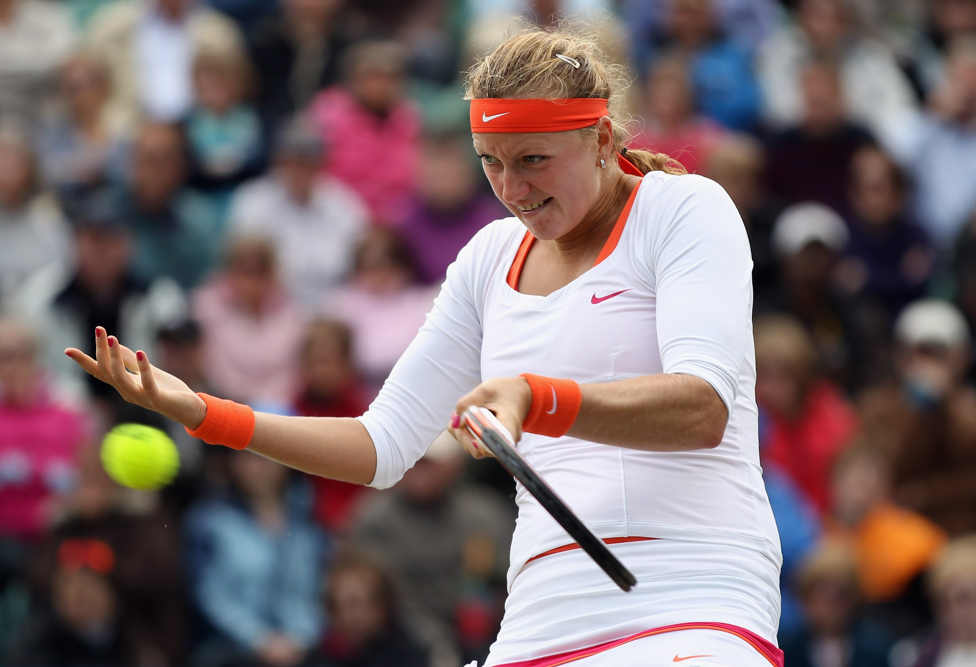 EASTBOURNE, ENGLAND - JUNE 18:  Petra Kvitova of the Czech Republic in action during her match against Marion Bartoli of France in the WTA Singles Final on day eight of the AEGON International at Devonshire Park on June 18, 2011 in Eastbourne, England.  (