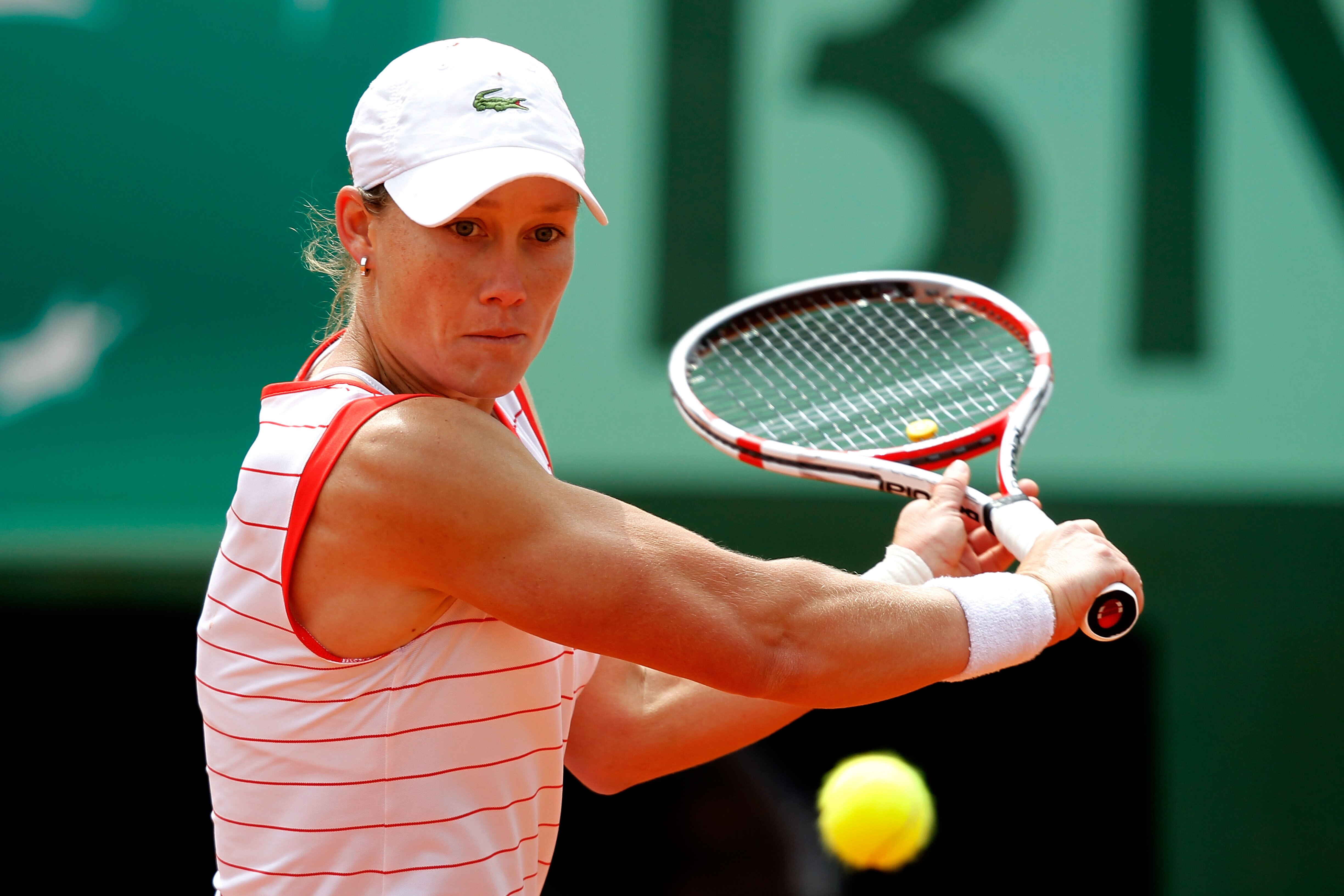 PARIS, FRANCE - MAY 27:  Samantha Stosur of Australia hits a backhand during the women's singles round three match between Gisela Dulko of Argentina and Samantha Stosur of Australia on day six of the French Open at Roland Garros on May 27, 2011 in Paris,