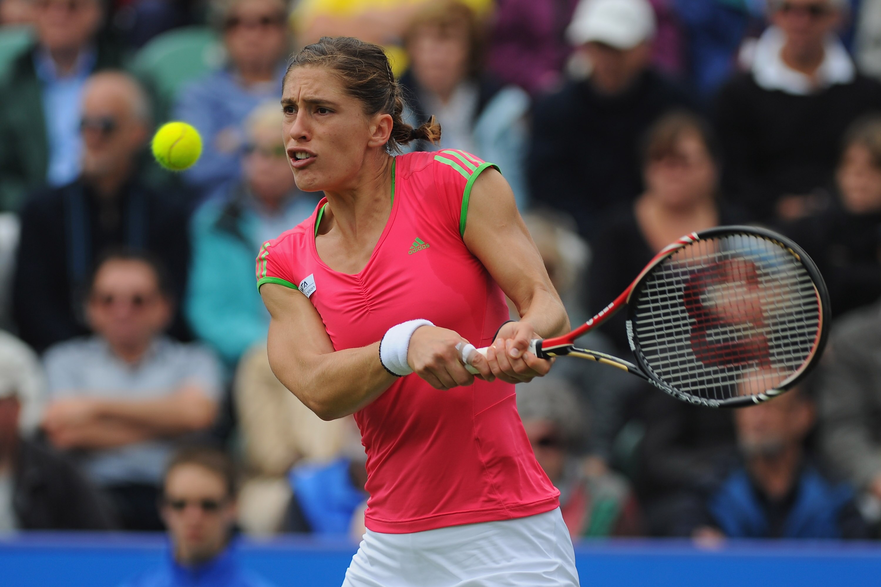 EASTBOURNE, ENGLAND - JUNE 13:  Andrea Petkovic of Germany in action against Venus Williams of USA during Day Three of the AEGON International at Devonshire Park on June 13, 2011 in Eastbourne, England.  (Photo by Mike Hewitt/Getty Images)