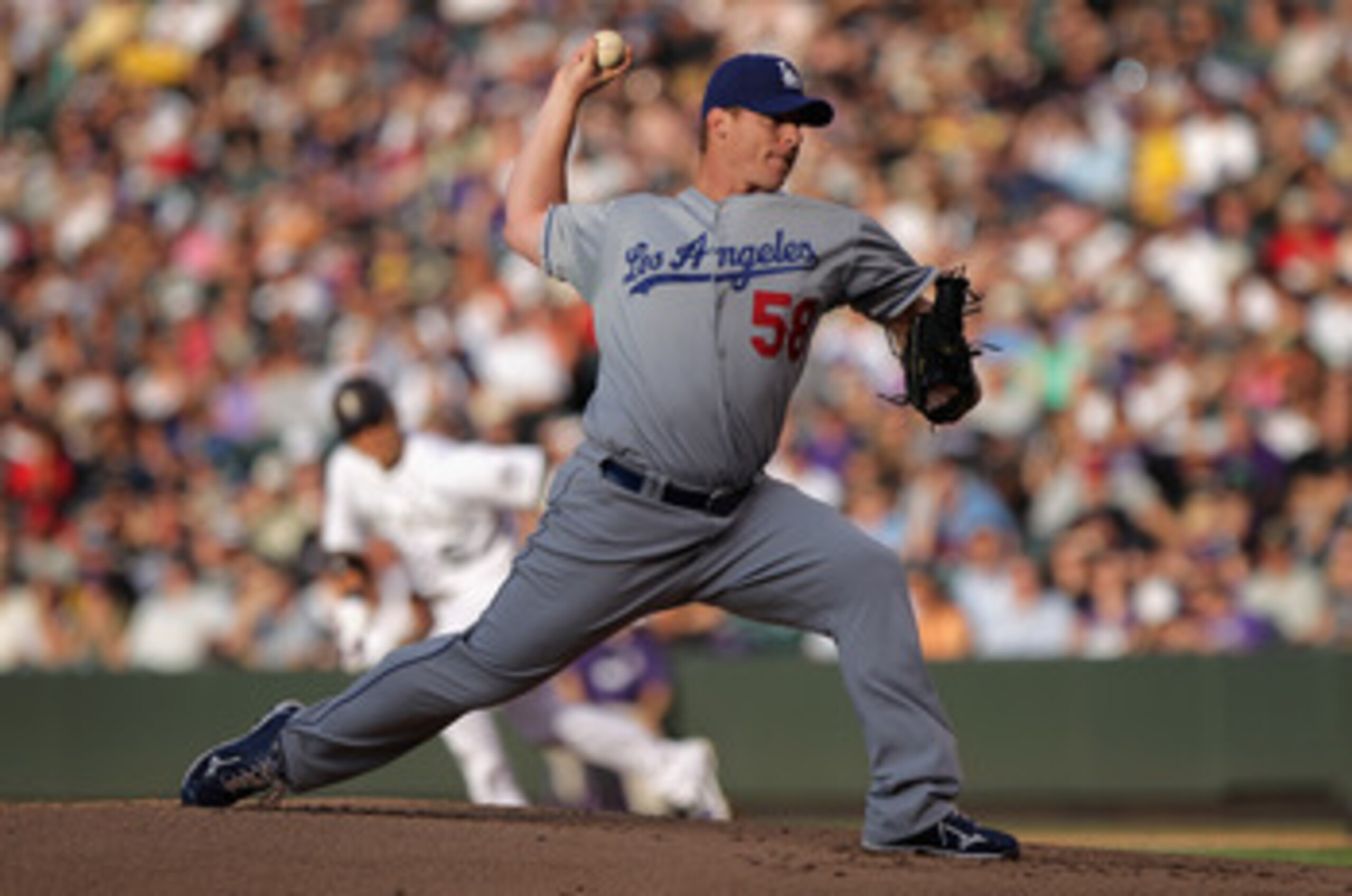 DENVER, CO - JUNE 10:  Starting pitcher Chad Billingsley #58 of the Los Angeles Dodgers delivers against the Colorado Rockies at Coors Field on June 10, 2011 in Denver, Colorado. Billingsley collected the loss as the Rockies defeated the Dodgers 6-5.  (Ph