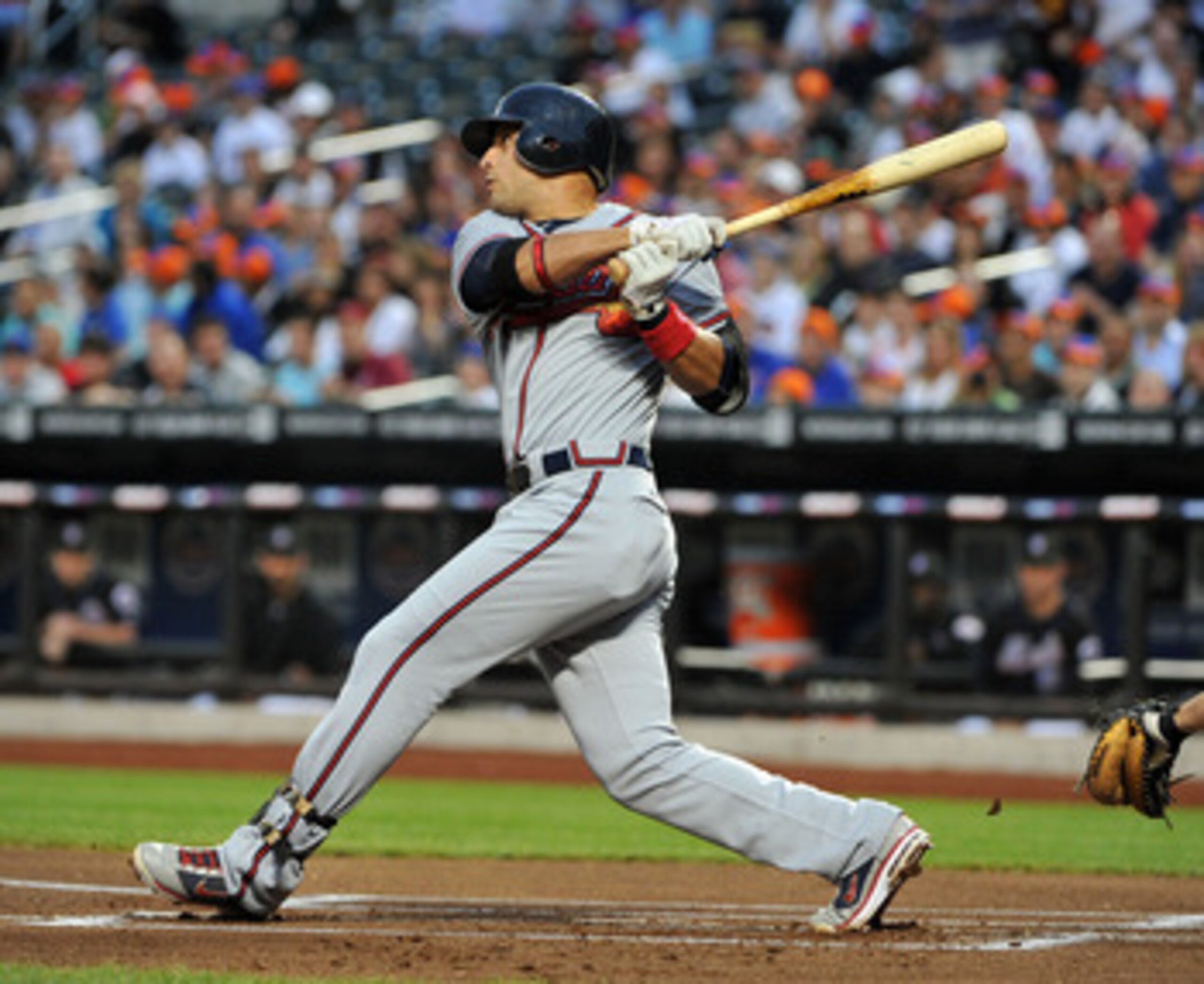 NEW YORK, NY - JUNE 04: Martin Prado #14 of the Atlanta Braves watches his first inning single against the New York Mets at Citi Field on June 4, 2011 in the Flushing neighborhood of the Queens borough of New York City. (Photo by Christopher Pasatieri/Get